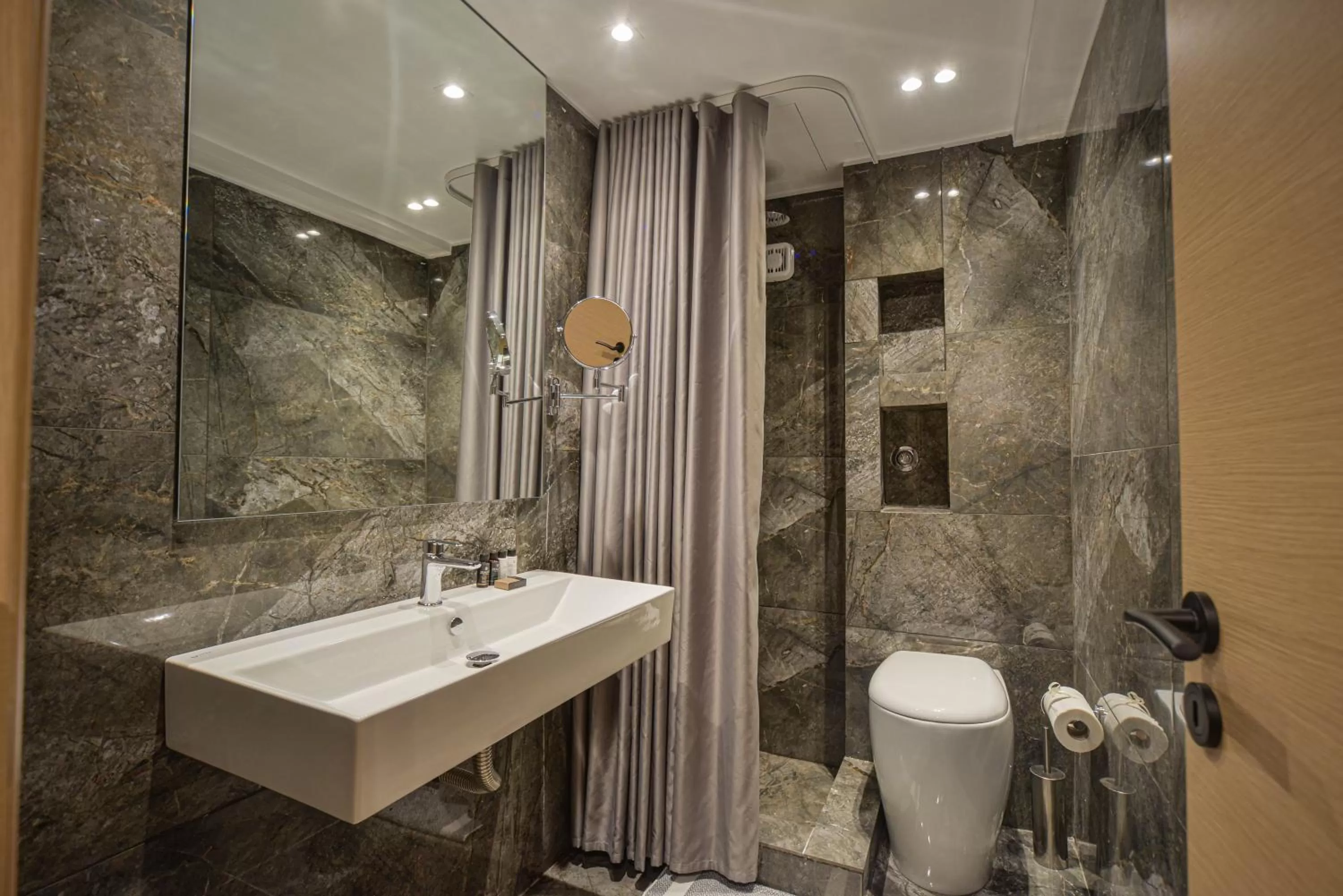 Bathroom in Anixi Hotel by AP