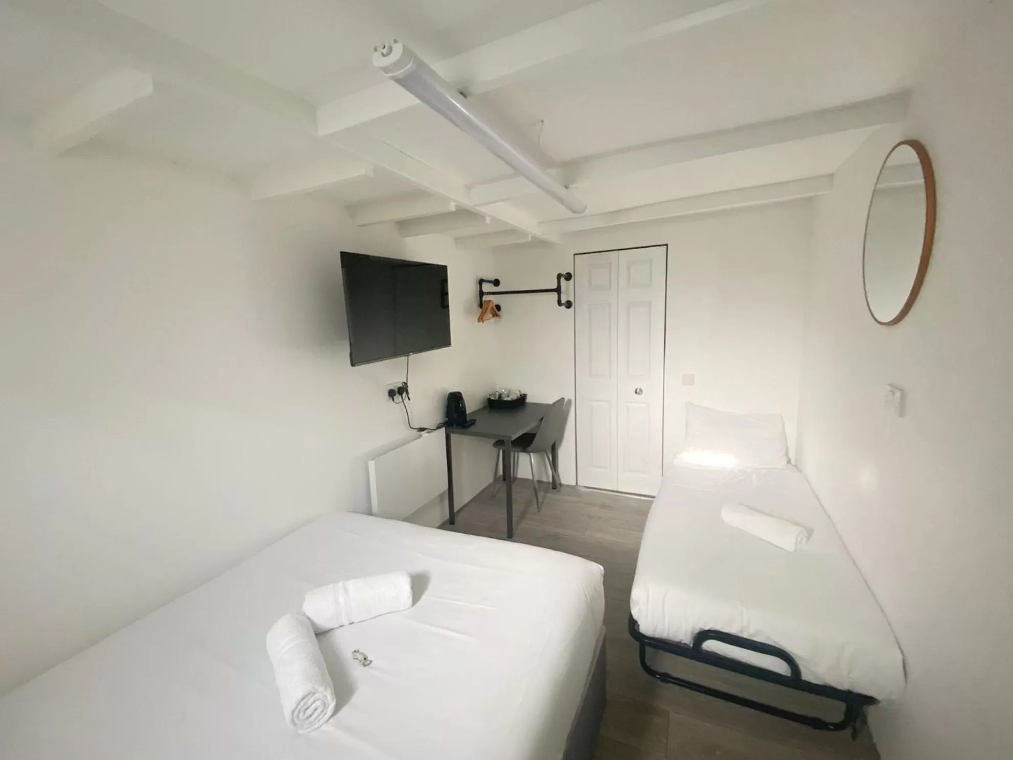 Bed in Anchor Guest House