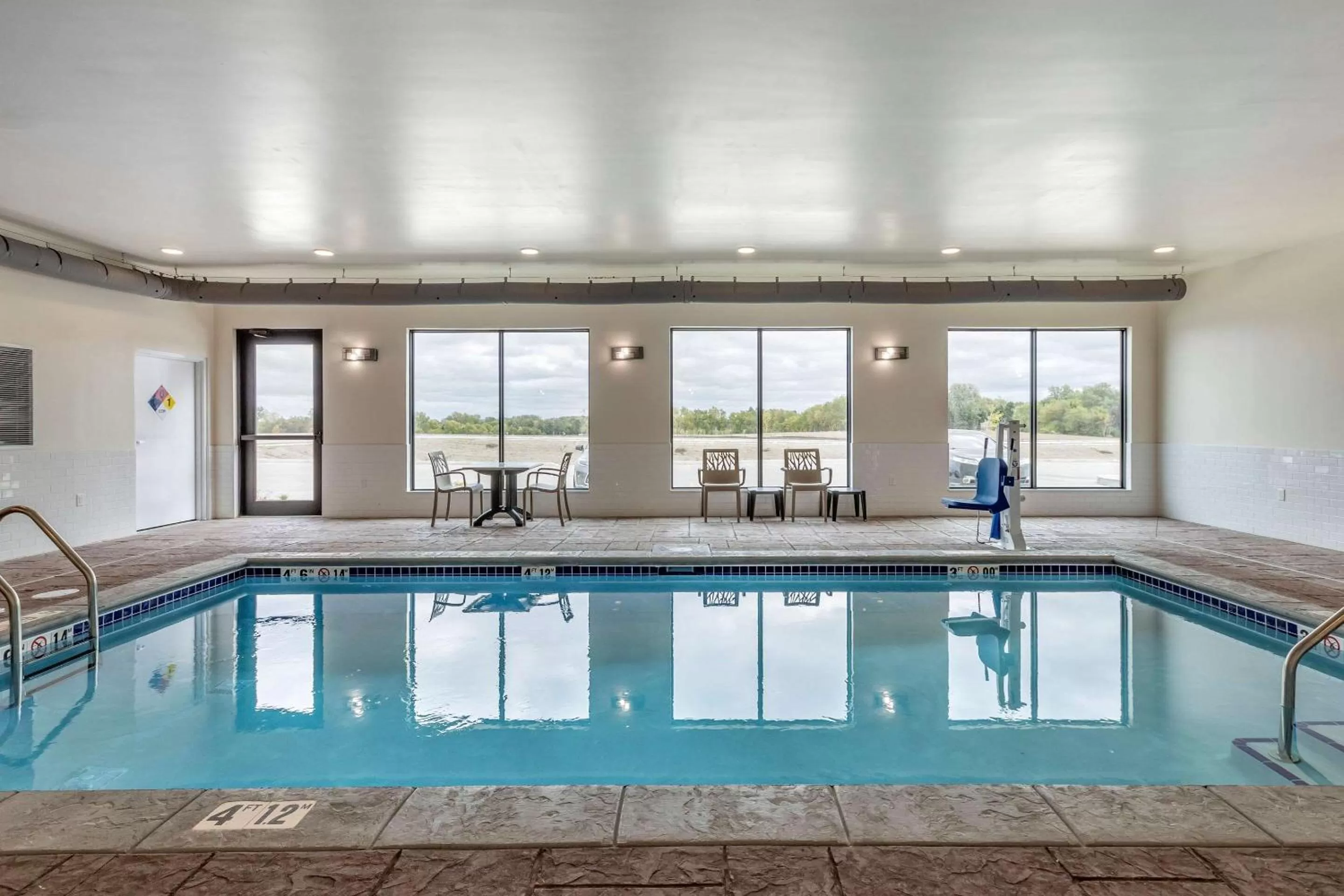 Swimming pool in MainStay Suites Waukee-West Des Moines