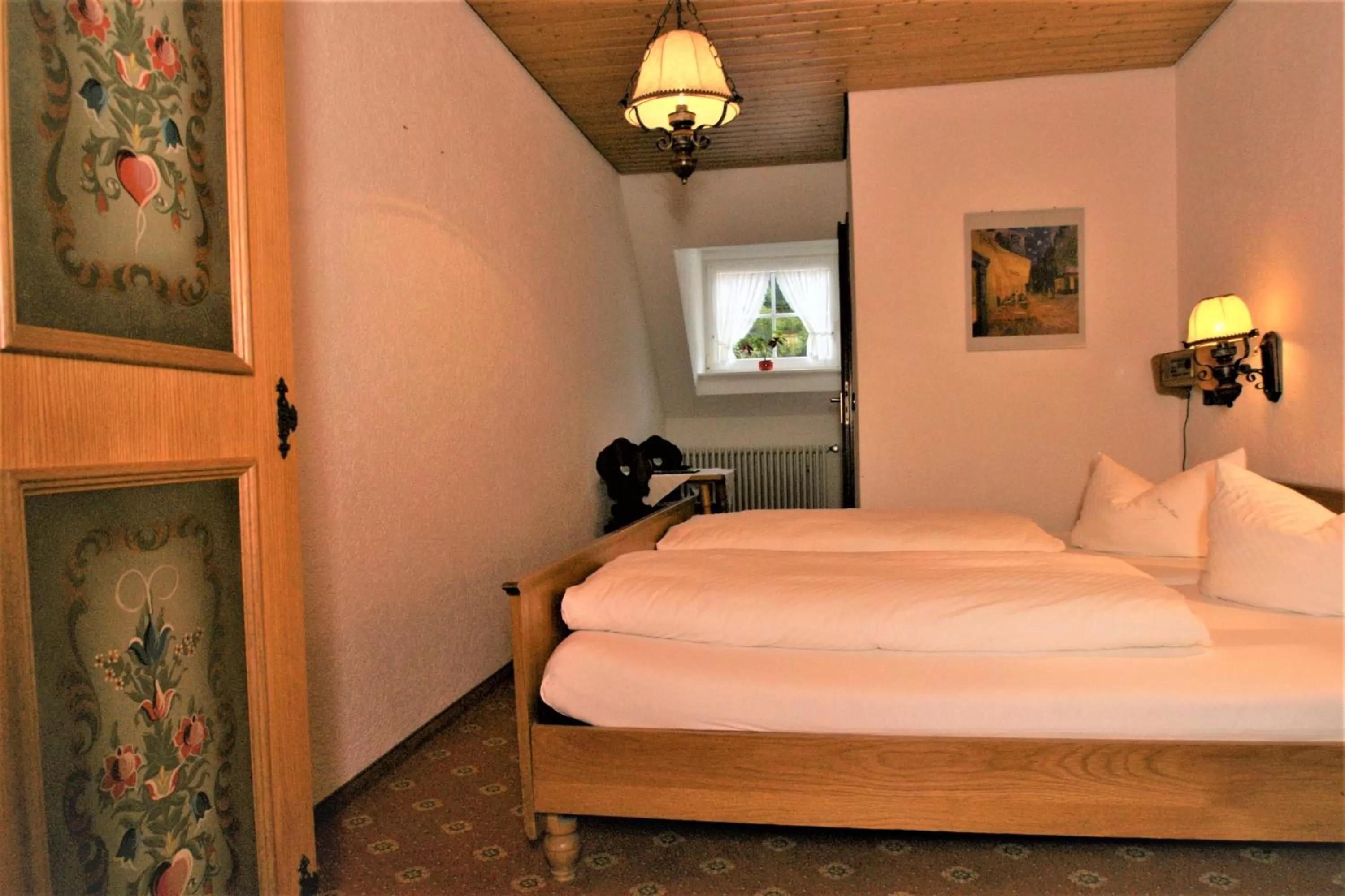 Photo of the whole room, Bed in ZUR TRAUBE Schwarzwaldhotel & Restaurant am Titisee