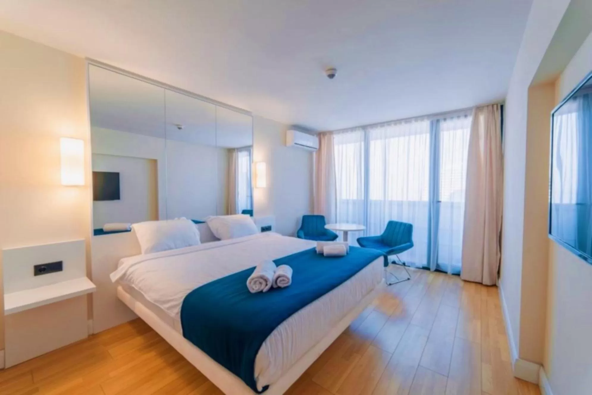 Bed in Elegance Sea View Aparthotel In Orbi City Batumi