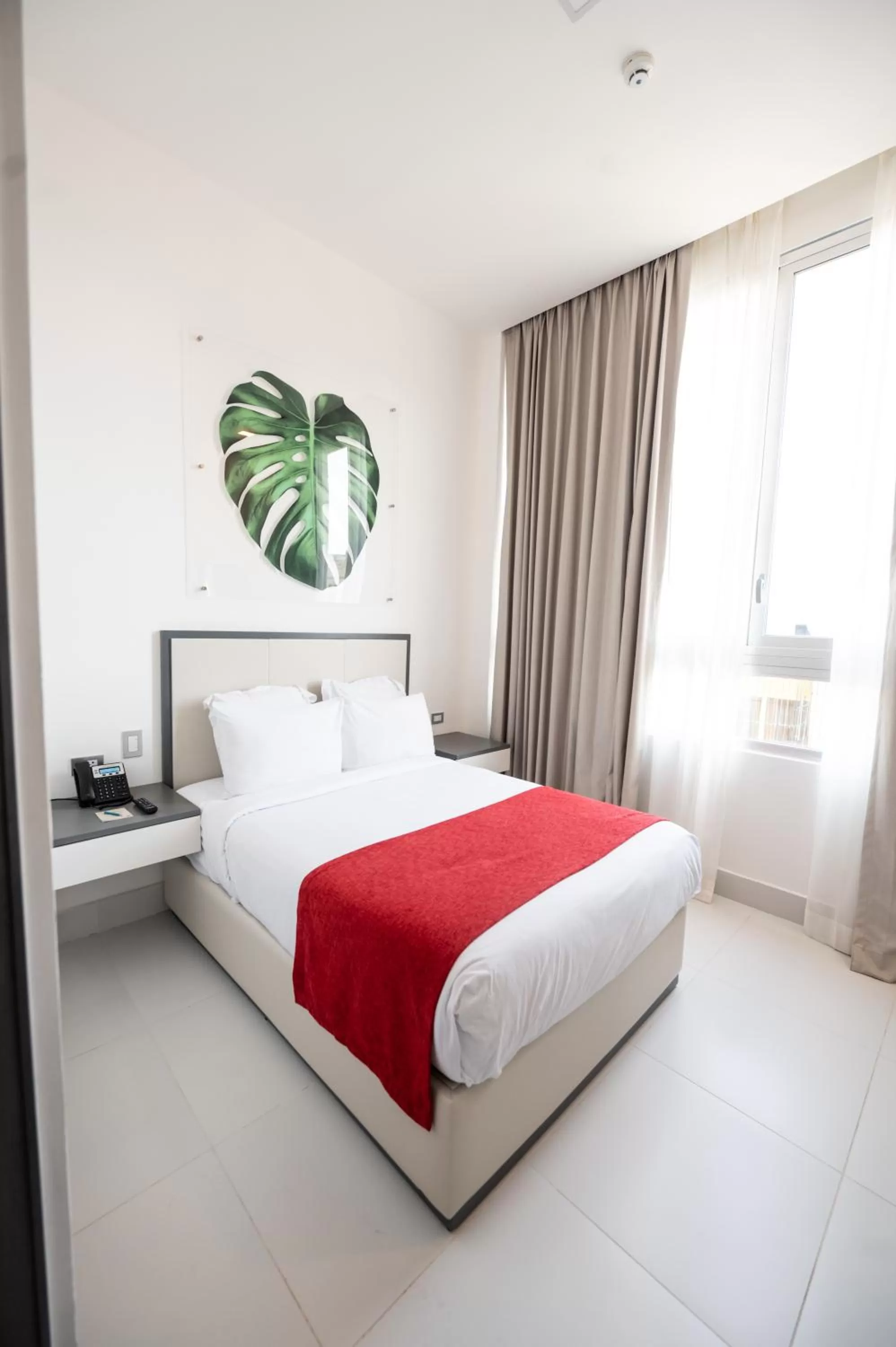 Bed in Gran Hotel Europa Santo Domingo Trademark Collection by Wyndham