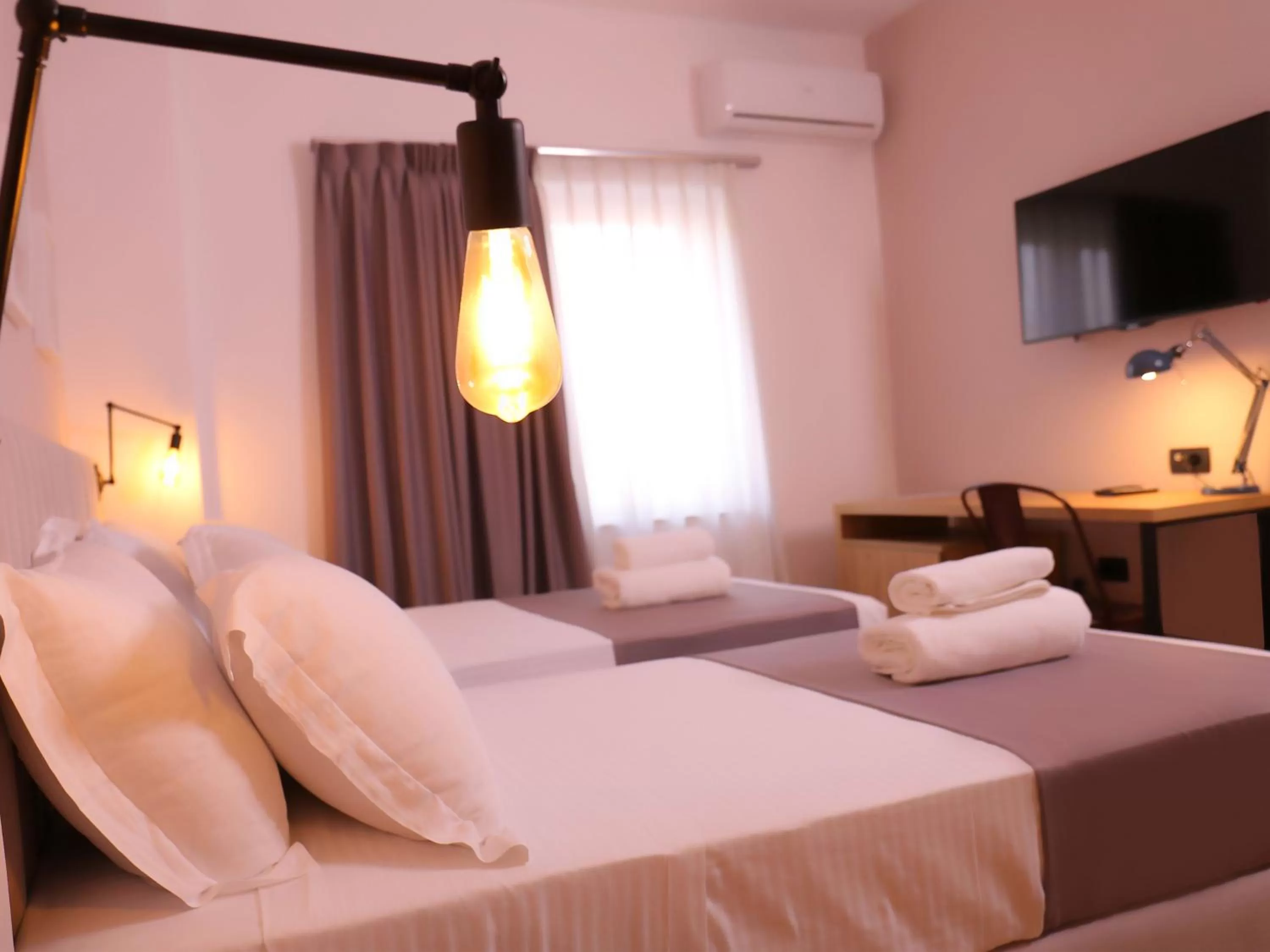 Bed in Oda Hotel Tirana