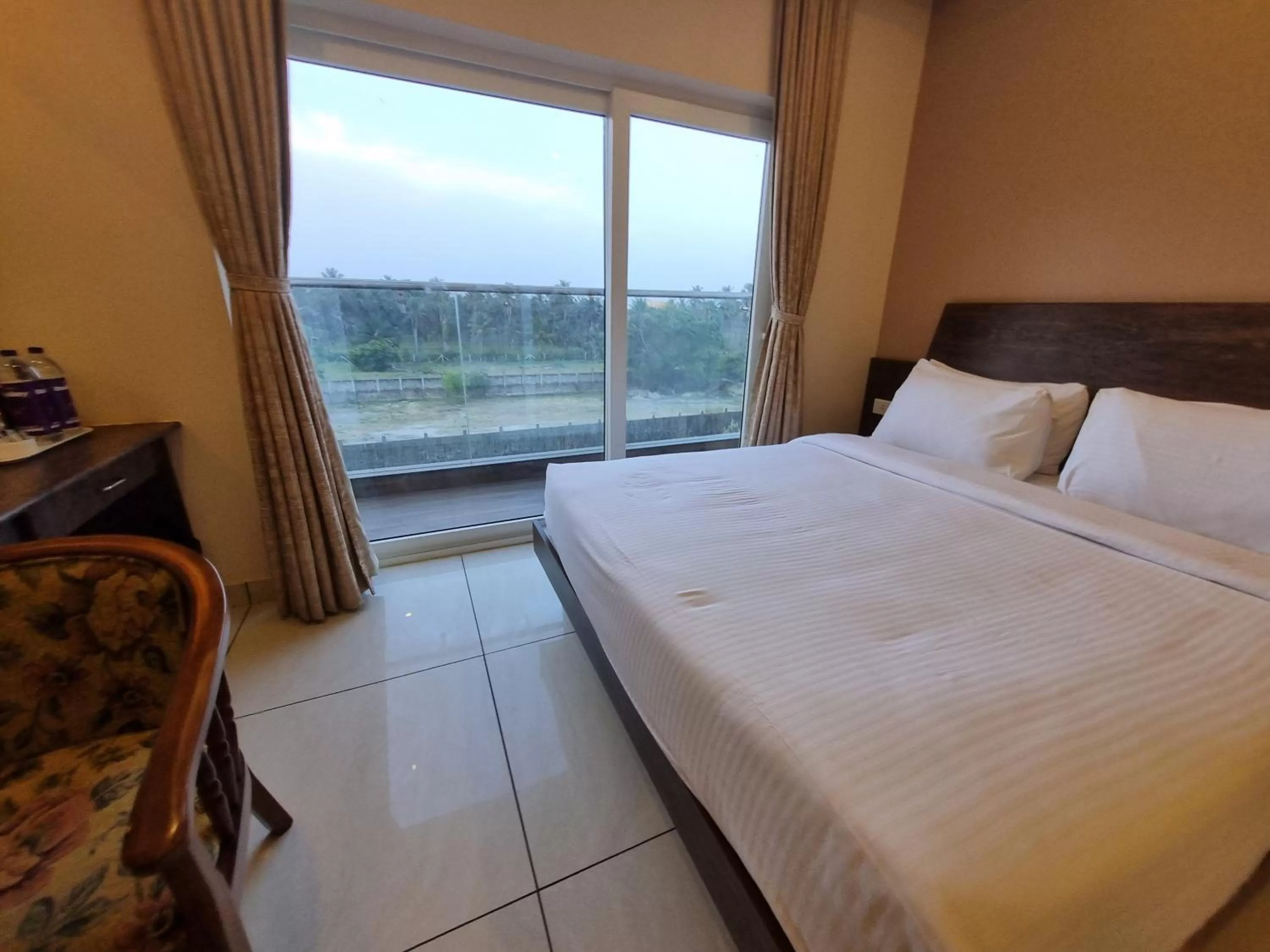 Balcony/Terrace, Bed in PLUTUS RESIDENCY