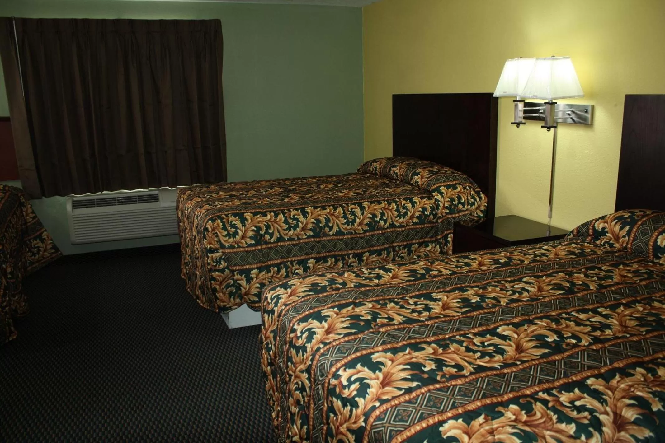 Bed in Deluxe Inn Fort Stockton