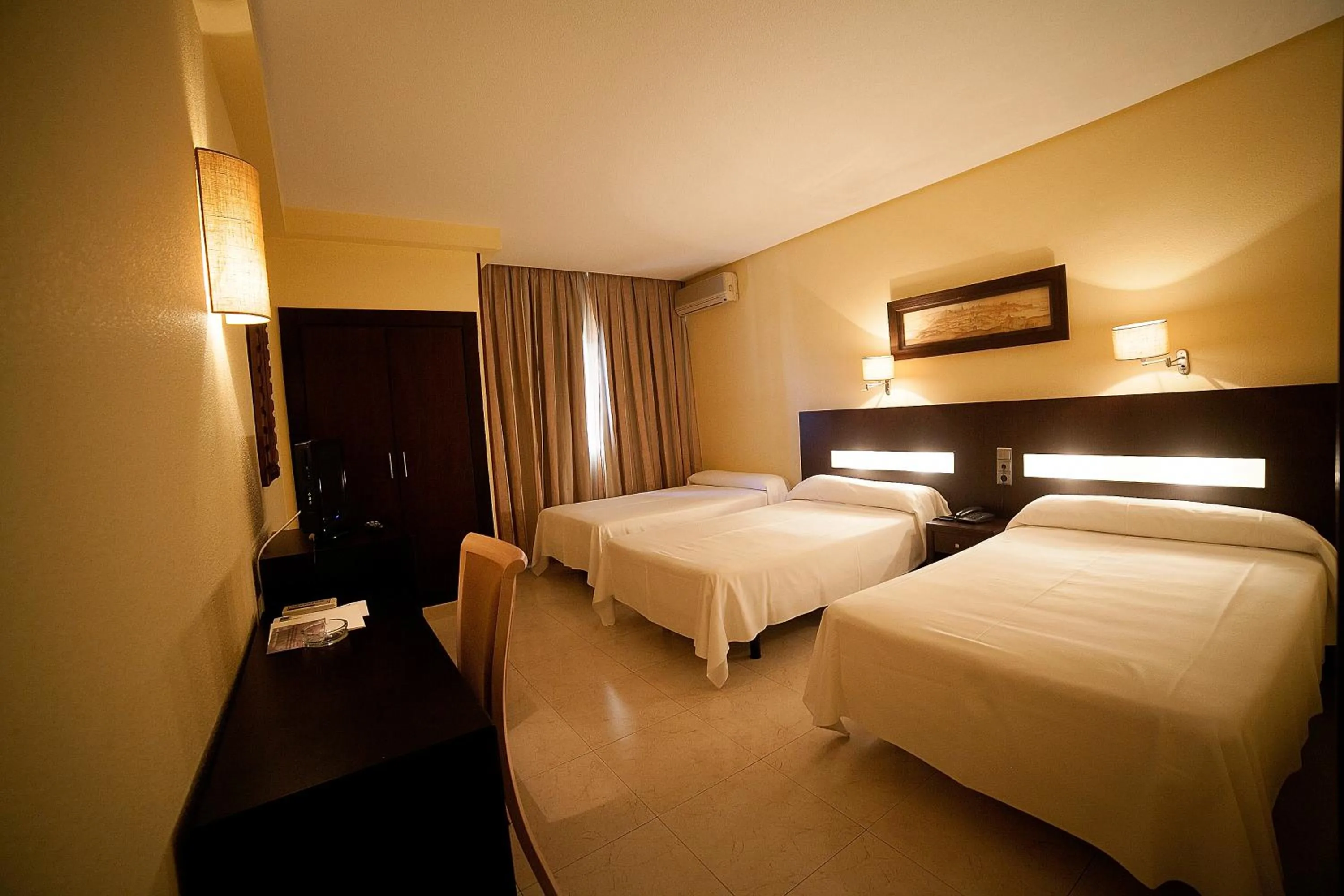 Bed in Hotel El Mesón