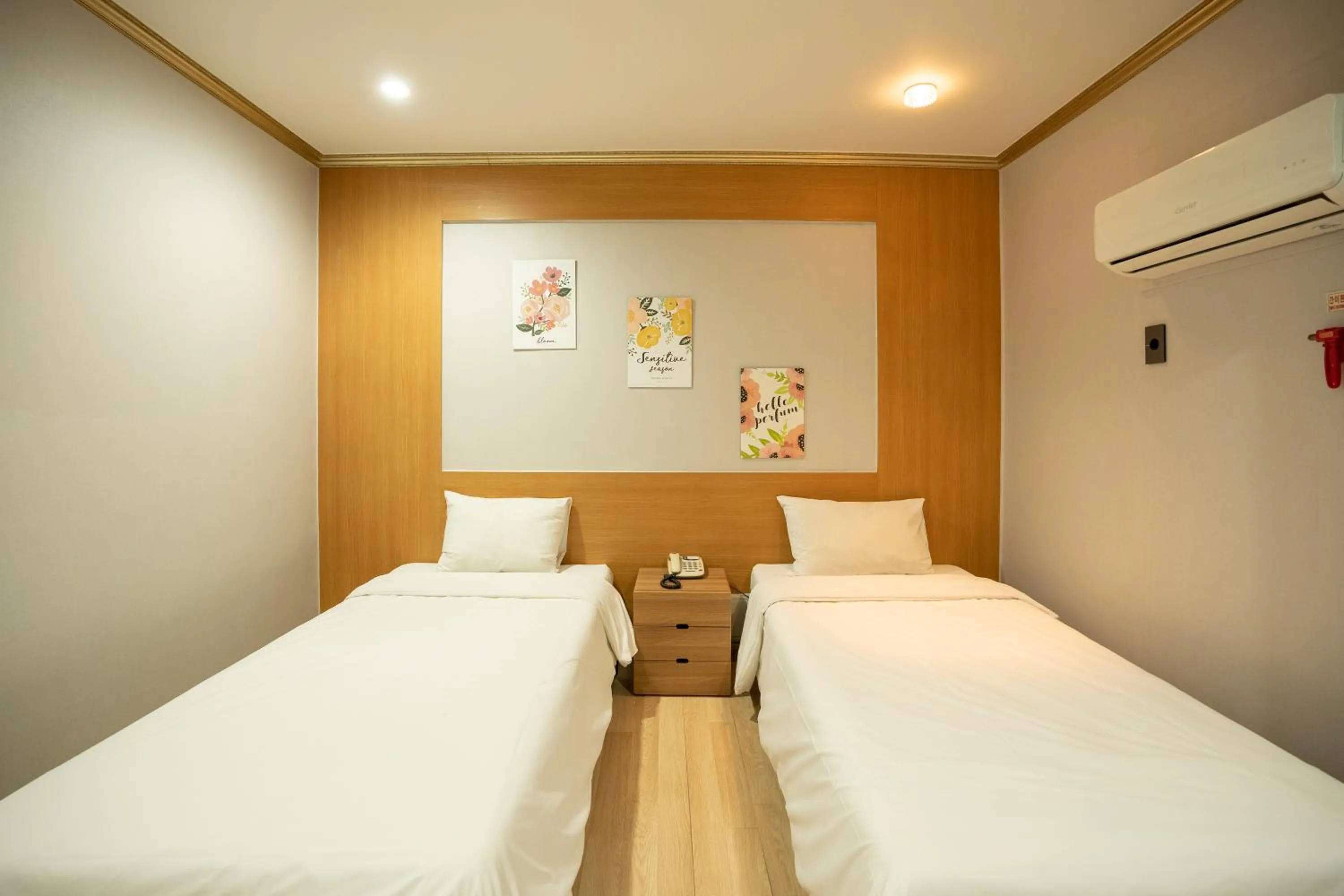 Bed in Jeju Stay Hotel