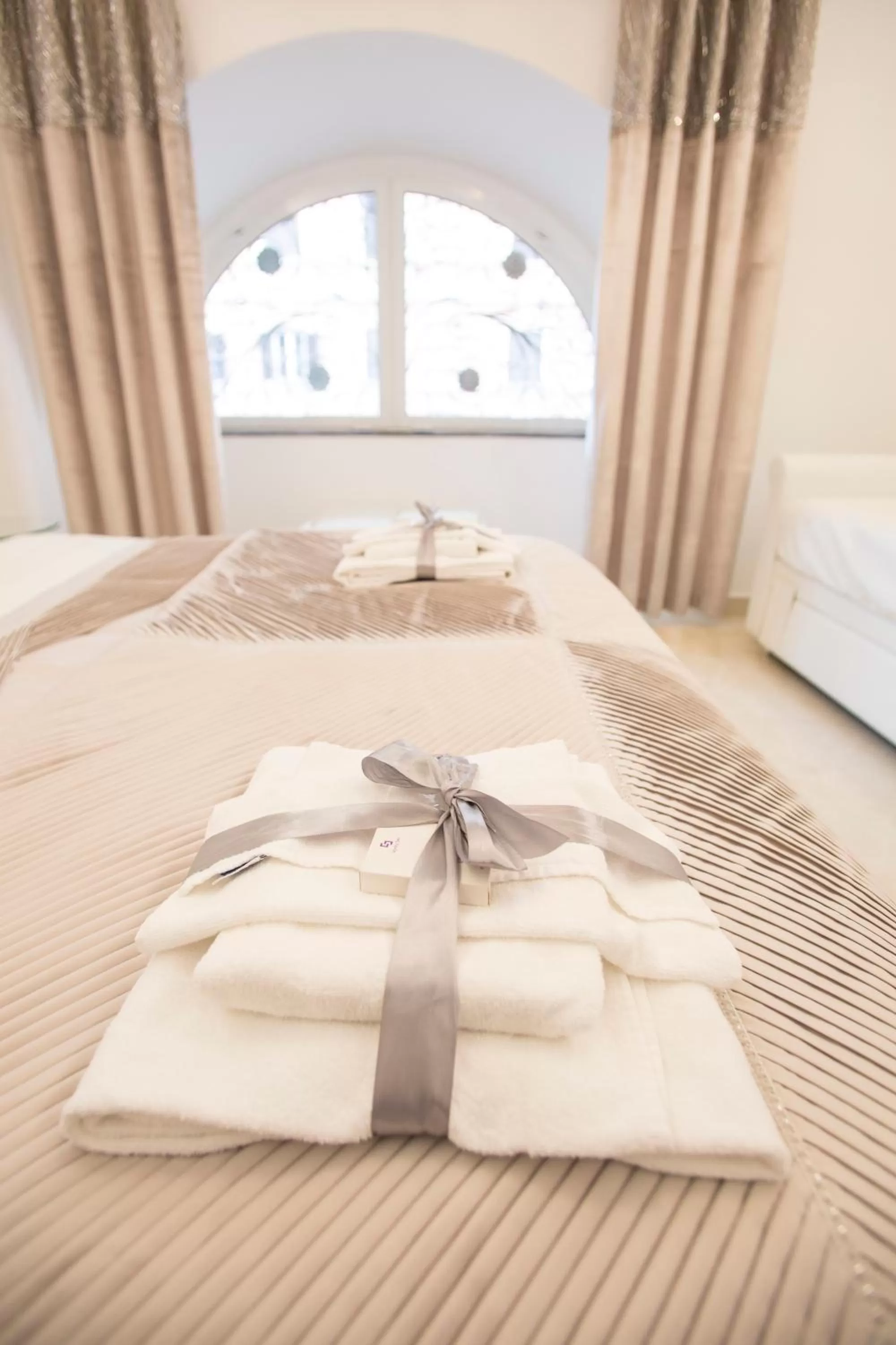 Bed in San Pietro Grand Suite