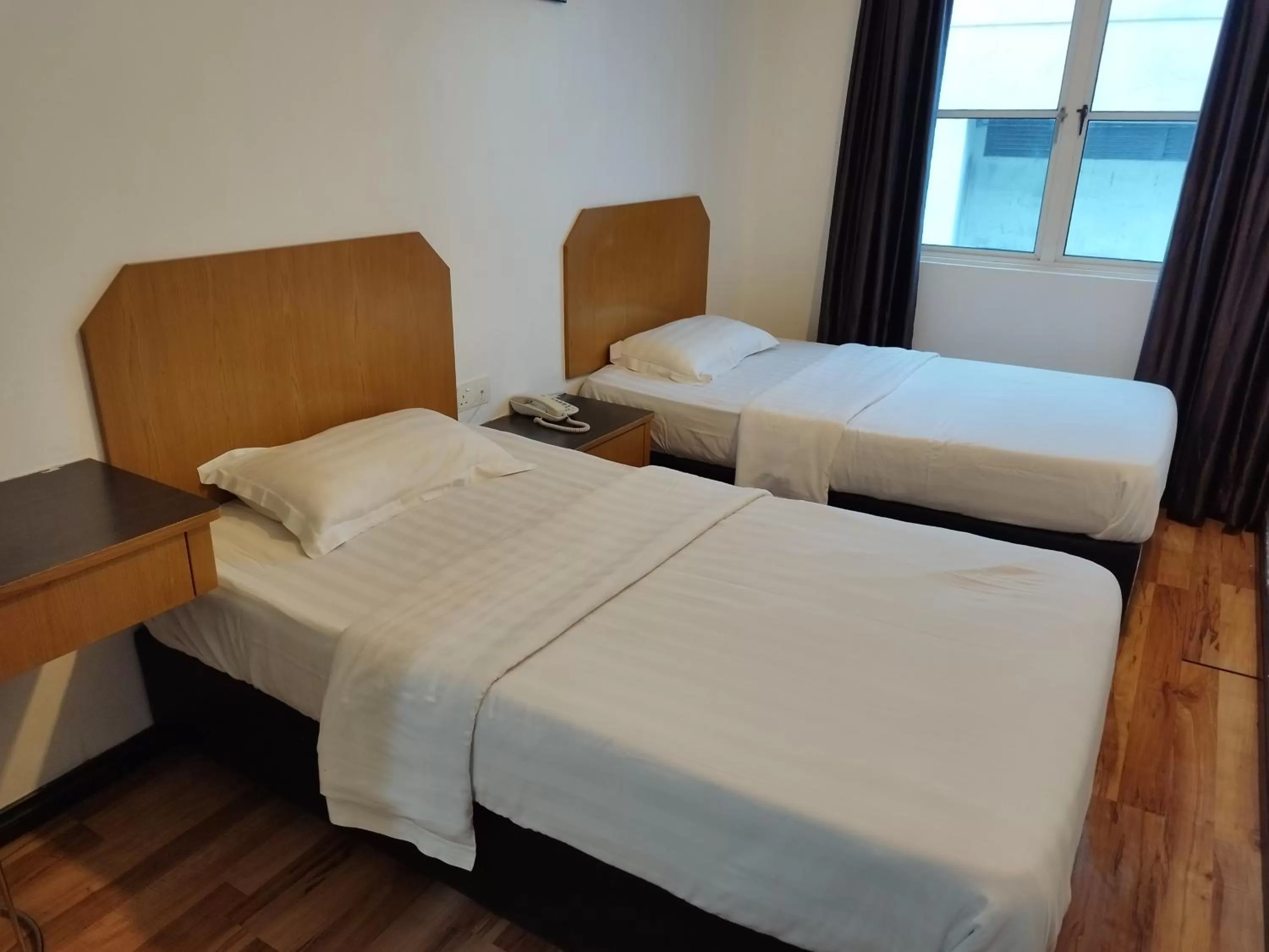 Bed in Marine Bay Hotel