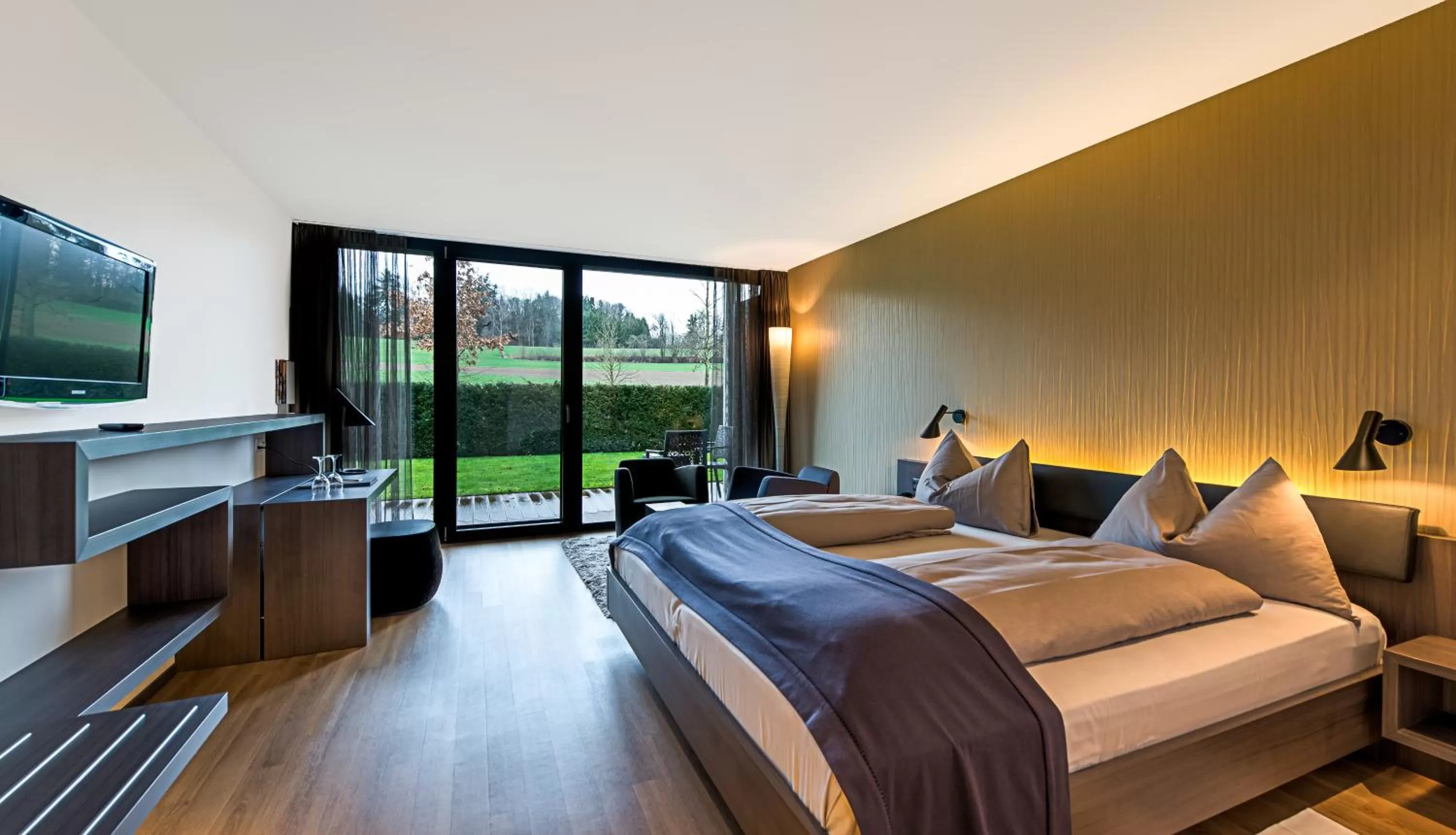 Photo of the whole room, Bed in Wellnesshotel Golfpanorama