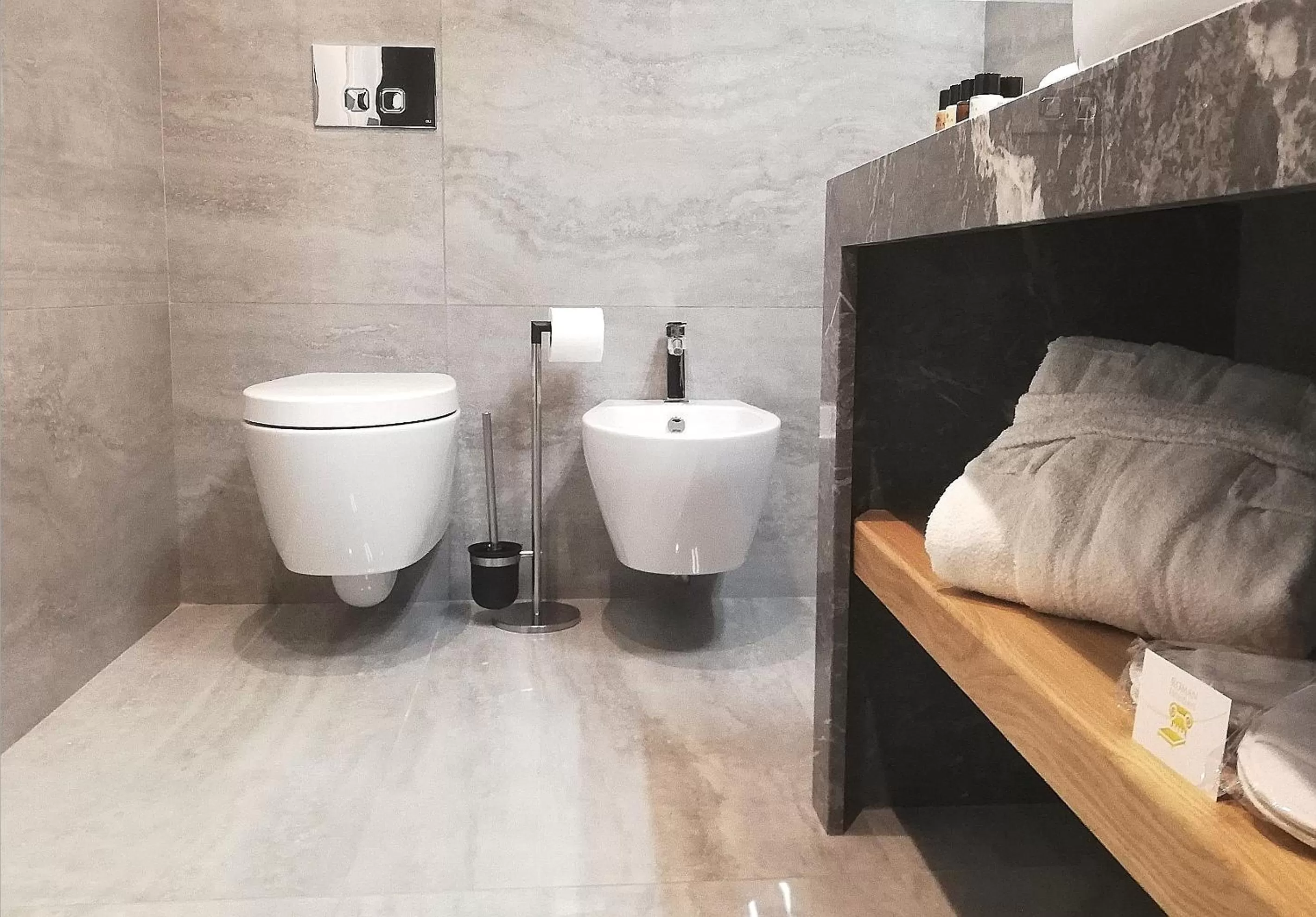 Toilet in Roman Holidays Boutique Hotel