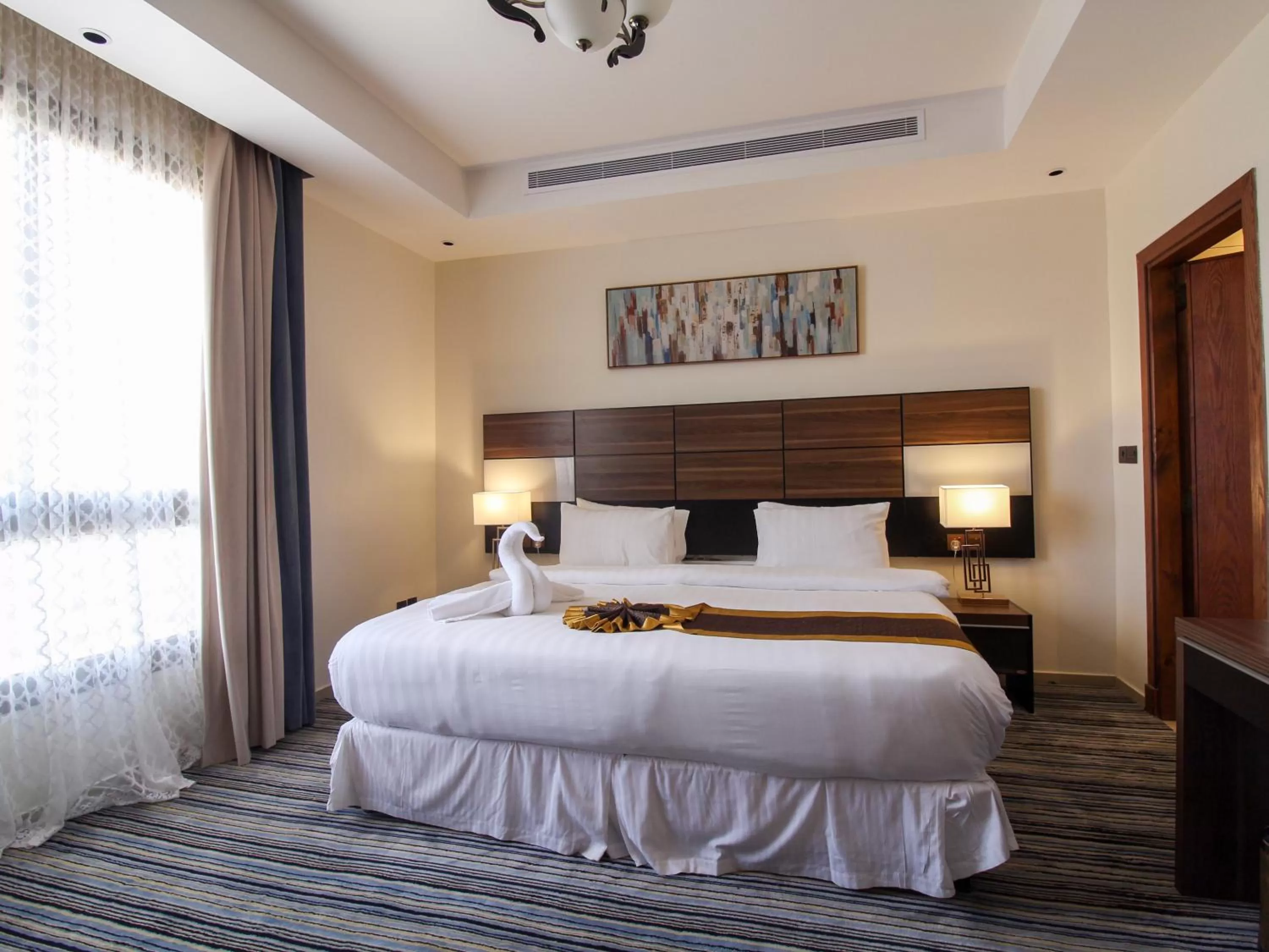 Bed in Friesian Hotel Suites