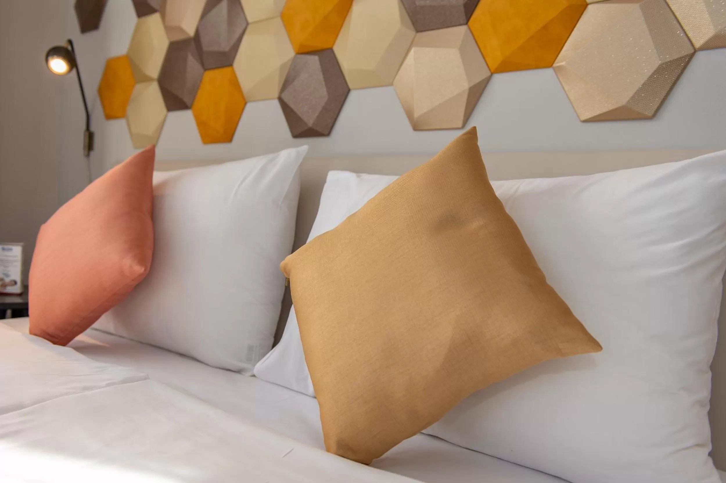 Bed in Three Corners Hotel Art