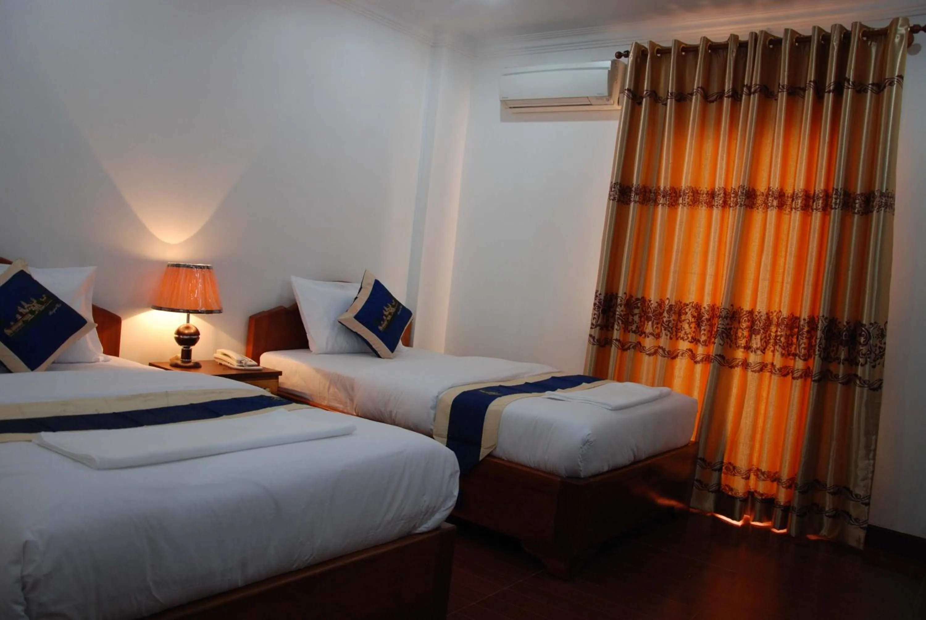 Decorative detail, Bed in Emerald BB Battambang Hotel