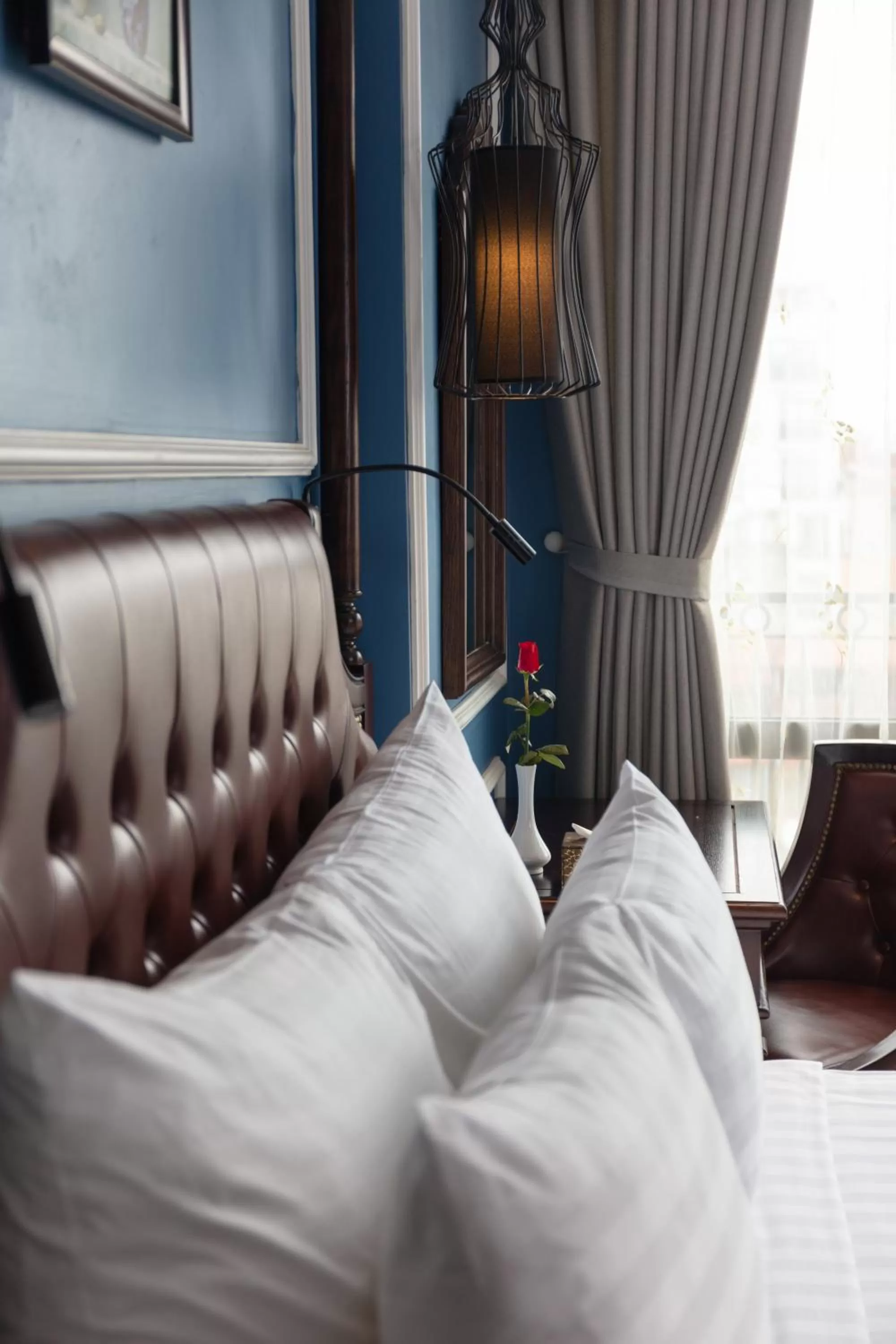 Bed in Suddha Boutique Hotel