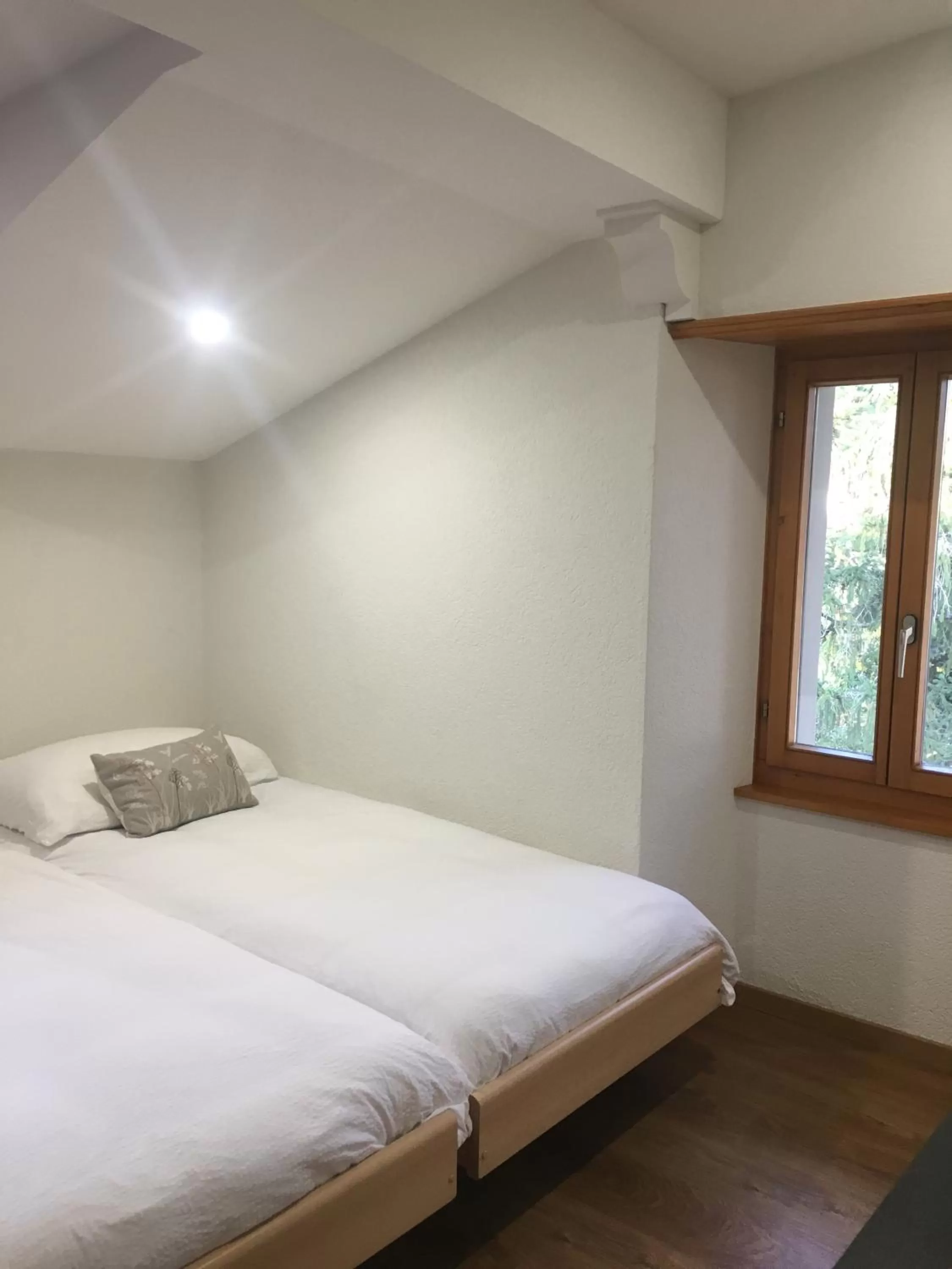 Bedroom, Bed in La Dent-du-Midi Hôtel & Restaurant