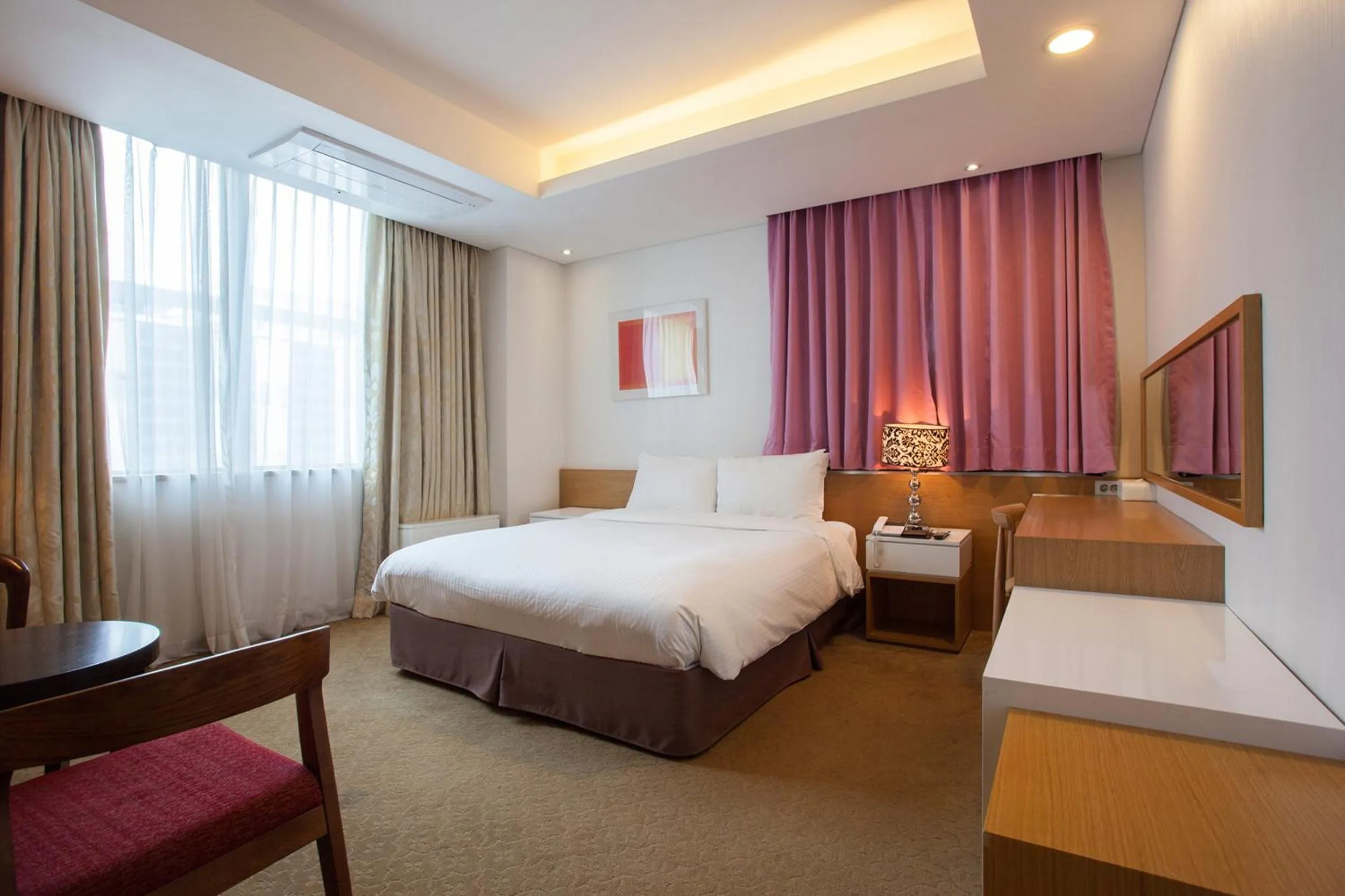 Living room, Bed in Hotel Pharos