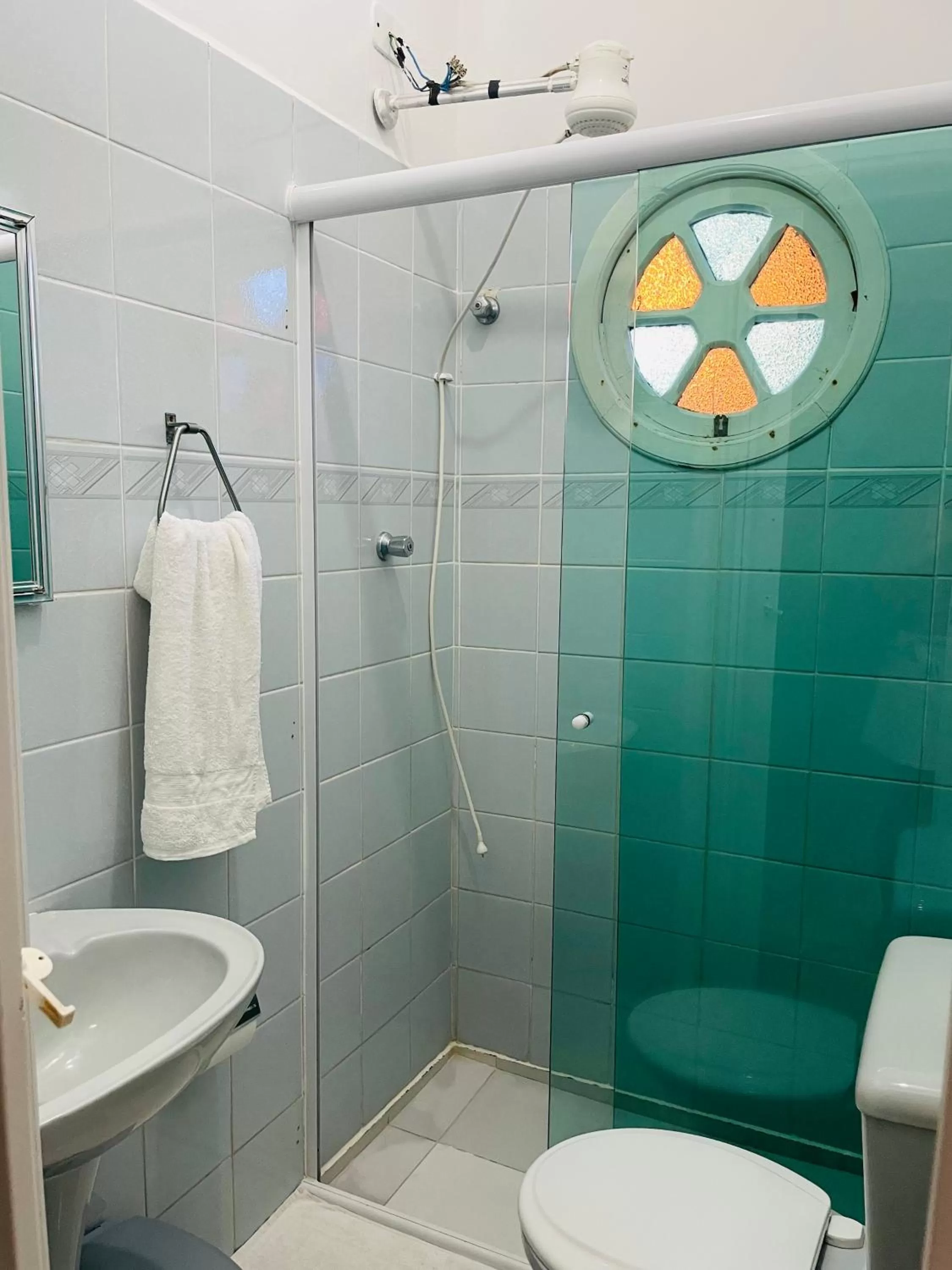 Shower in Pousada Praia do Tombo