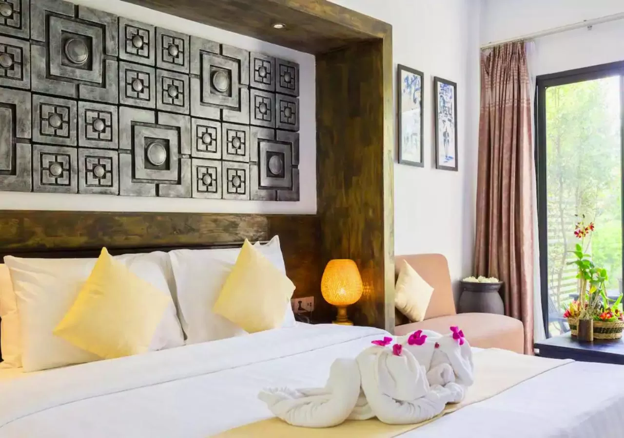 Bed in Ladear Privilege Rooms