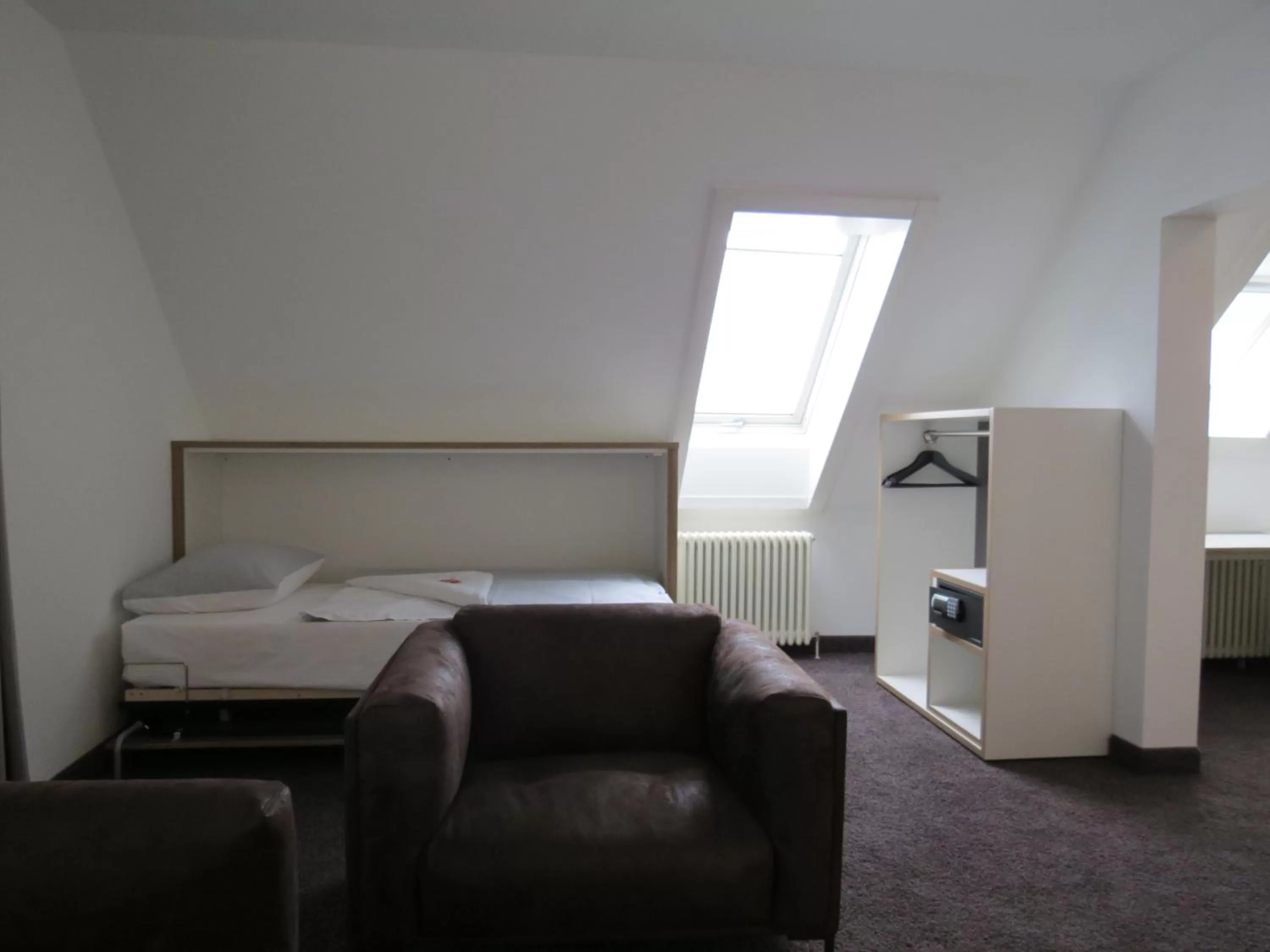 Photo of the whole room, Bed in Comfor Hotel Ulm City