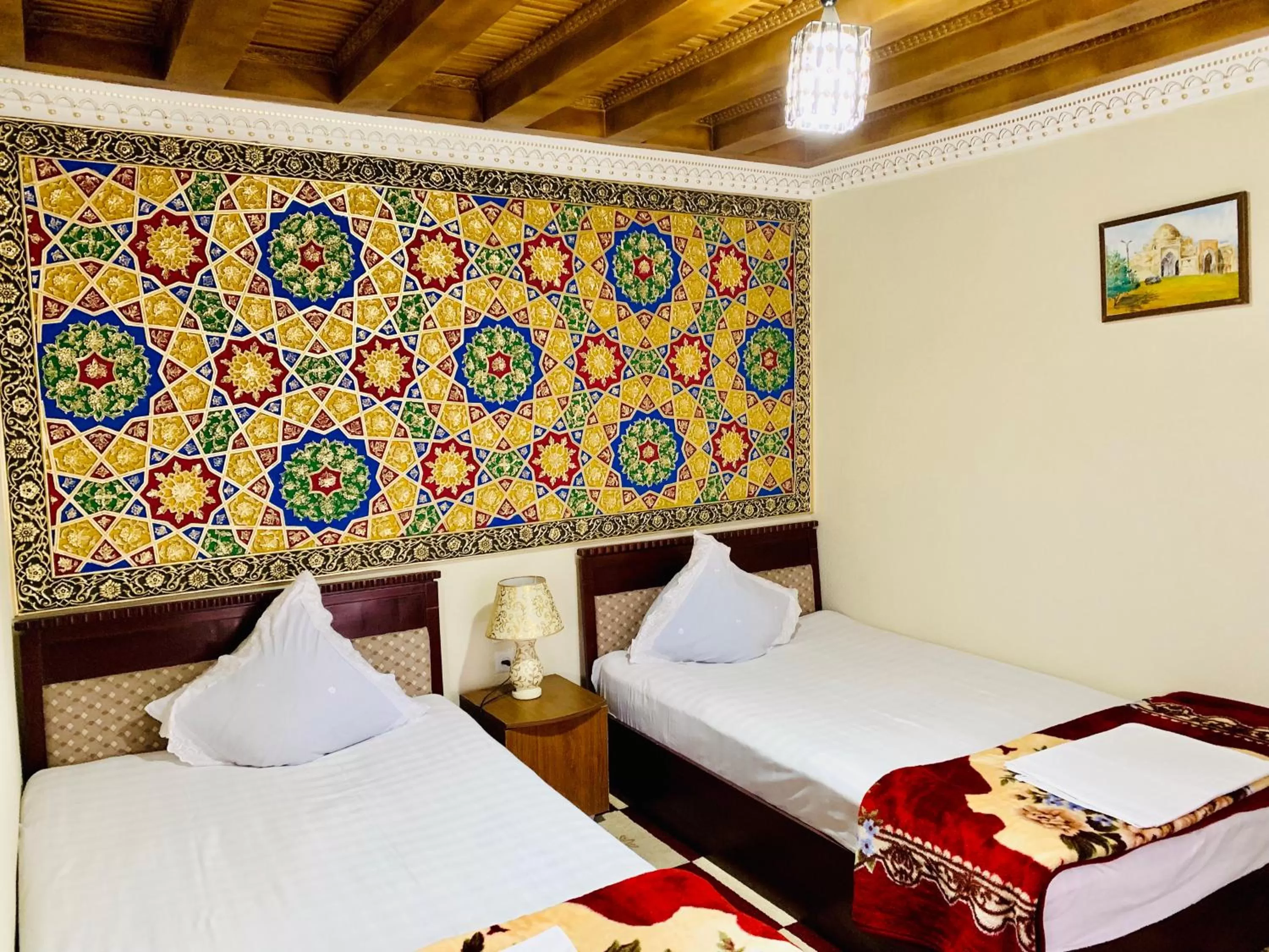 Bed in Sukhrob Barzu Hotel