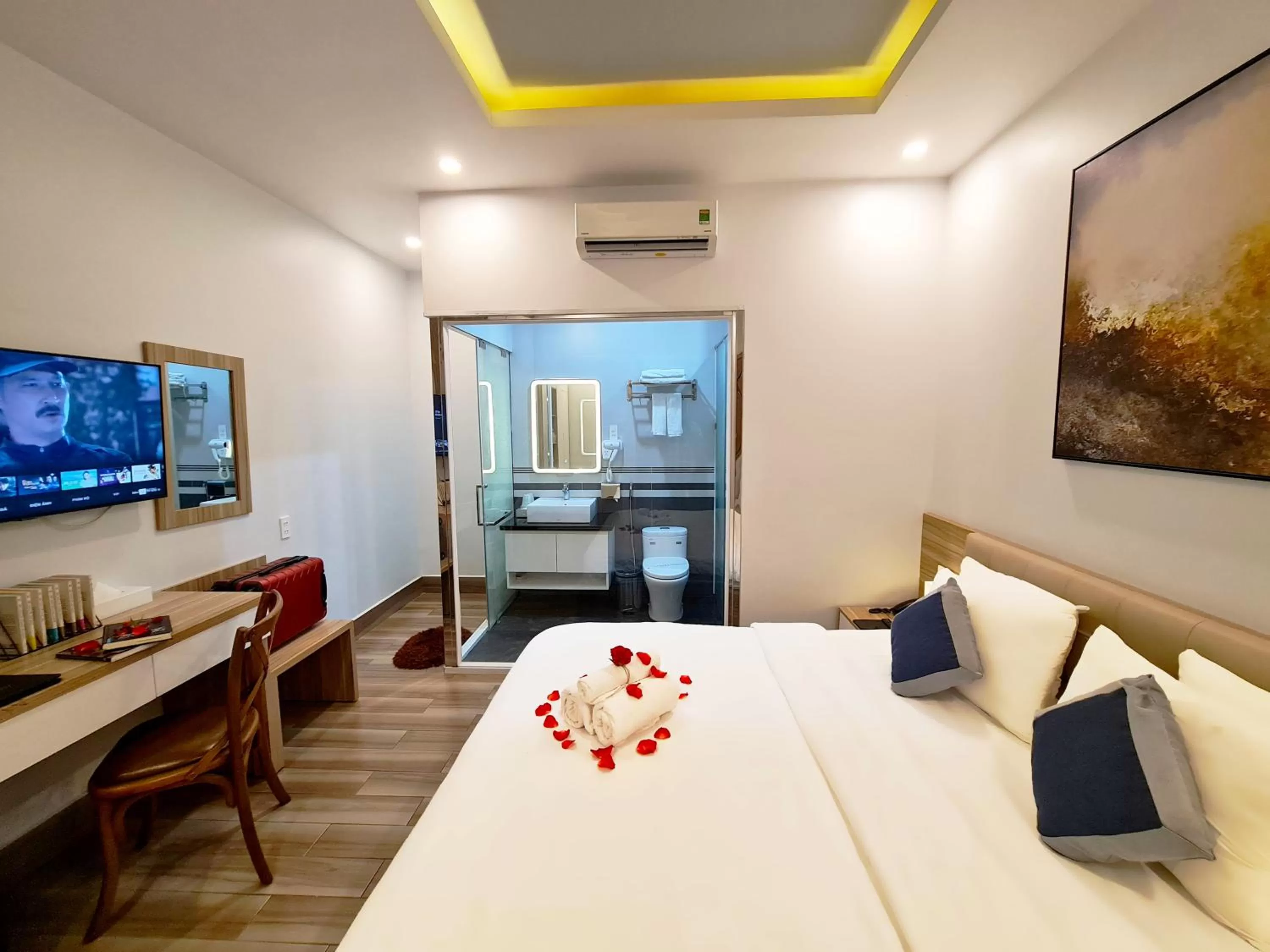 TV and multimedia, Bed in Dong Hai Hotel _ Rach Gia