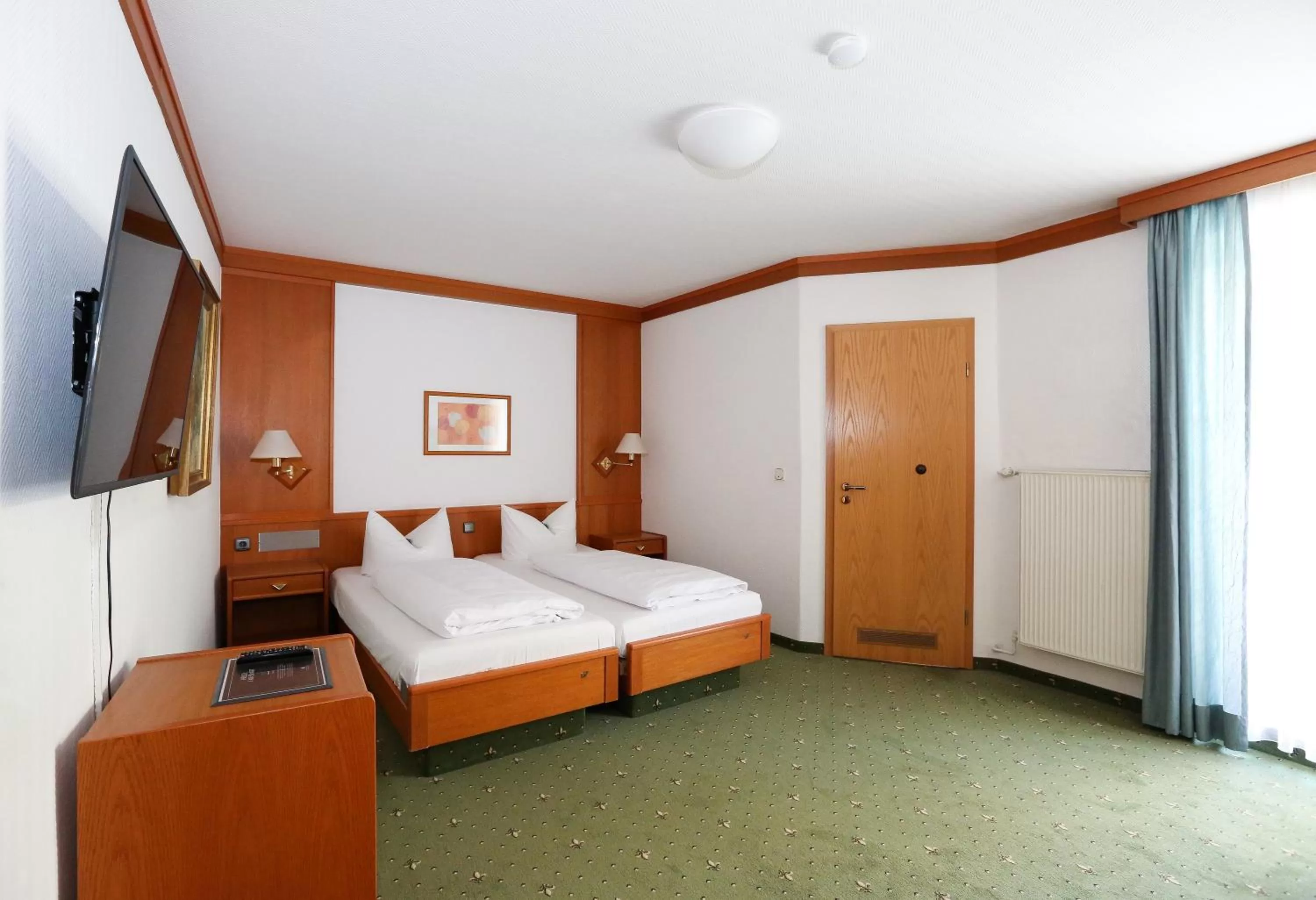 Bed in Arthotel ANA Goggl