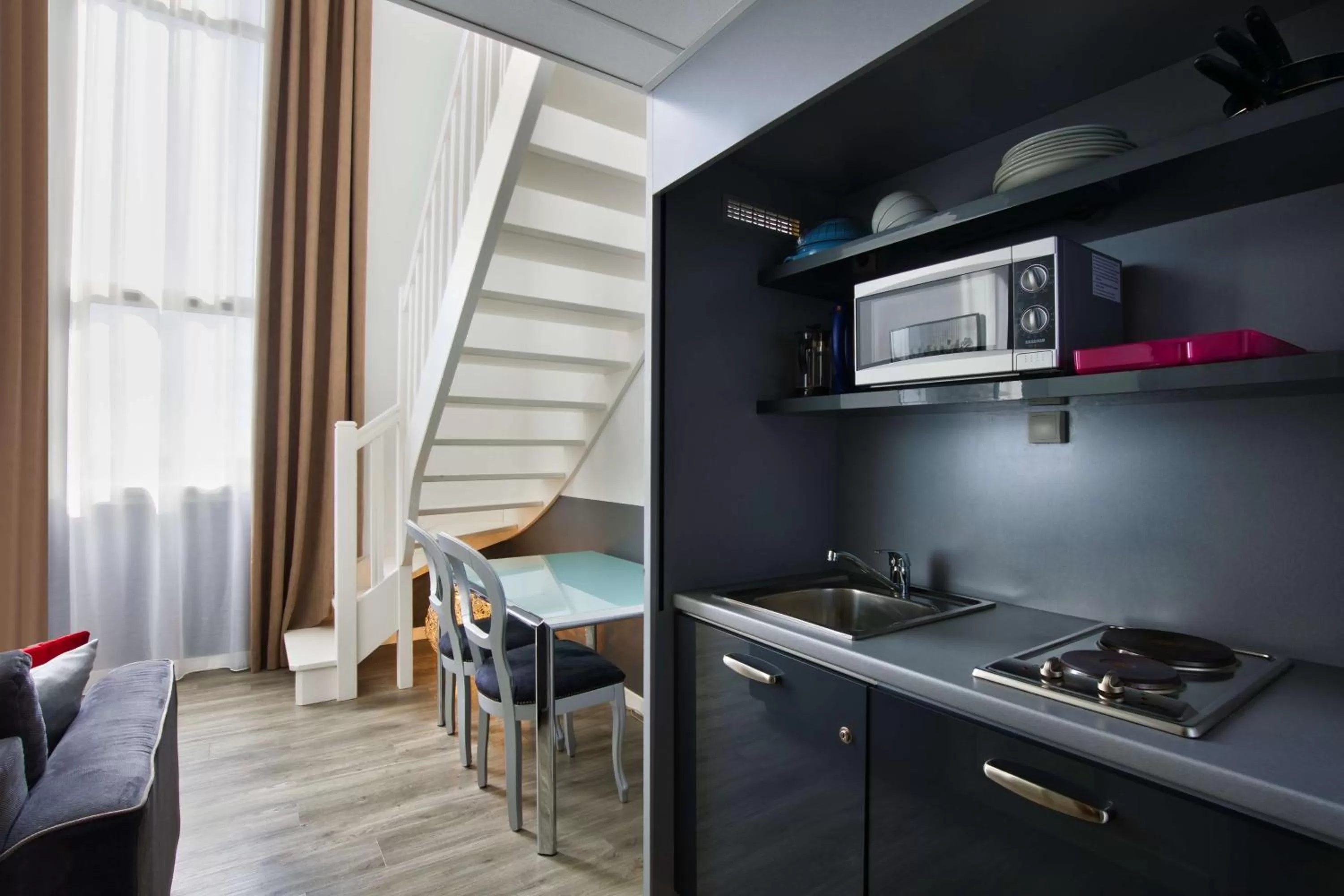 Kitchen or kitchenette in Sure Hotel by Best Western Nantes Beaujoire