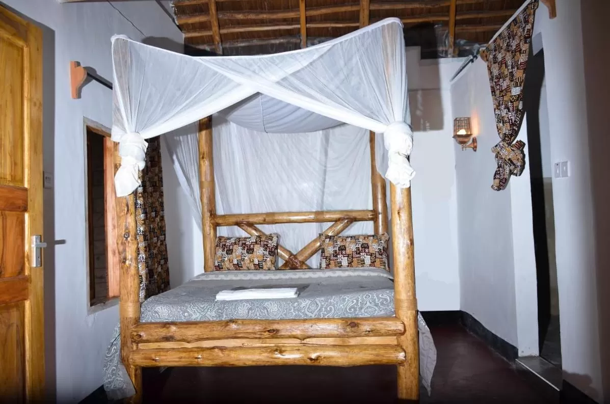 Bed in Charming Eco-Homestay near Kilimanjaro International Airport