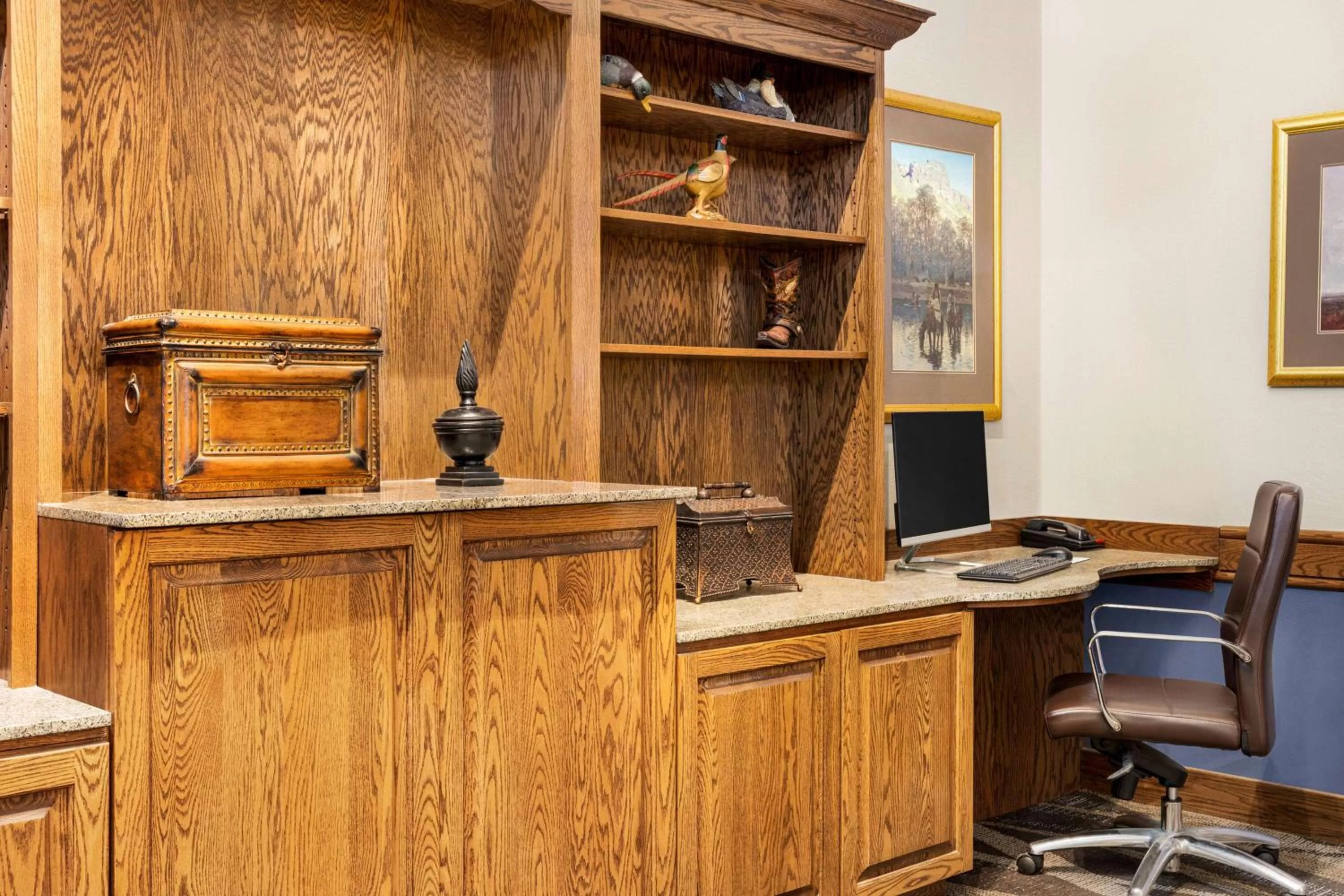 Lobby or reception in AmericInn by Wyndham Laramie Near University of Wyoming