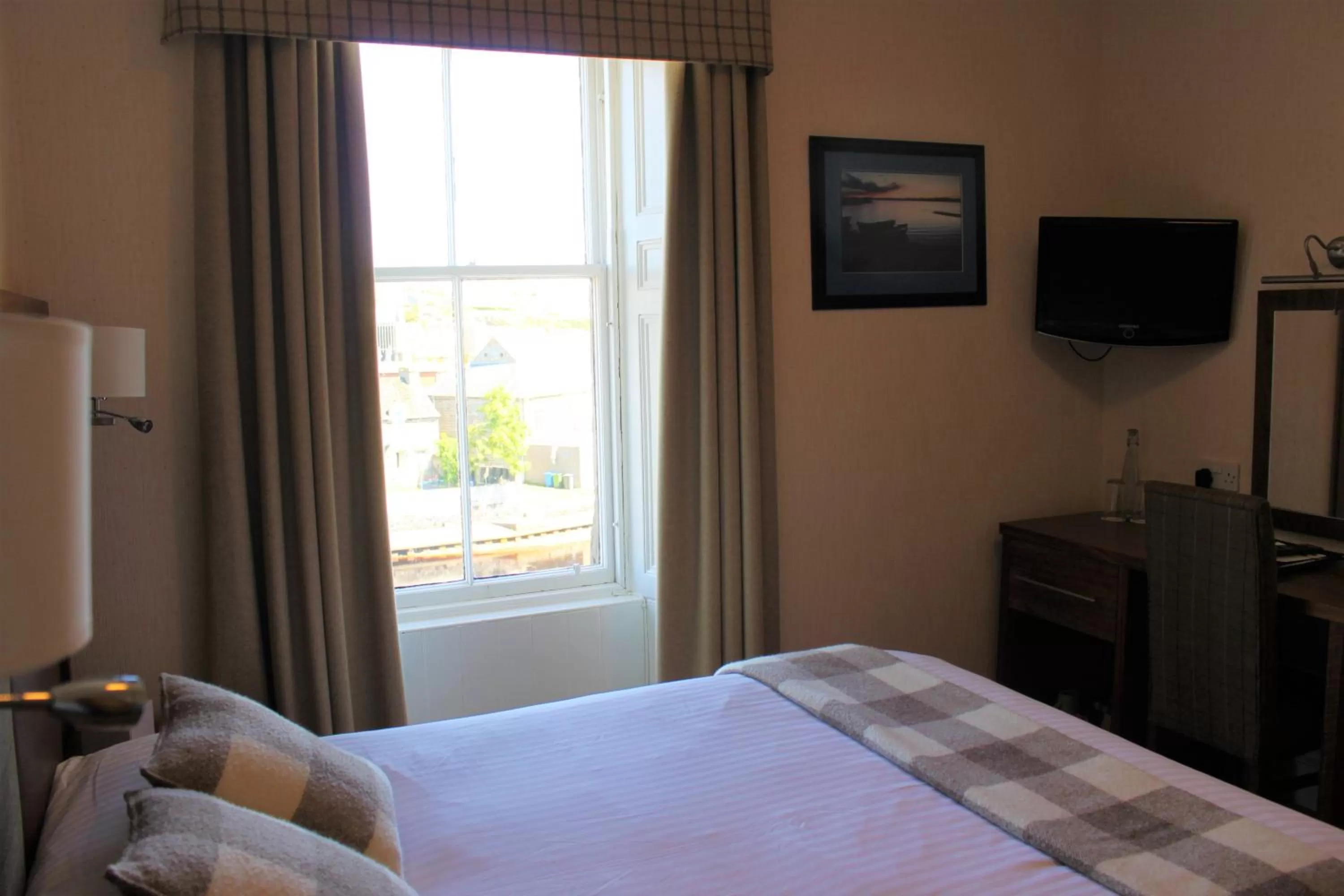 Bed in Mackays Hotel