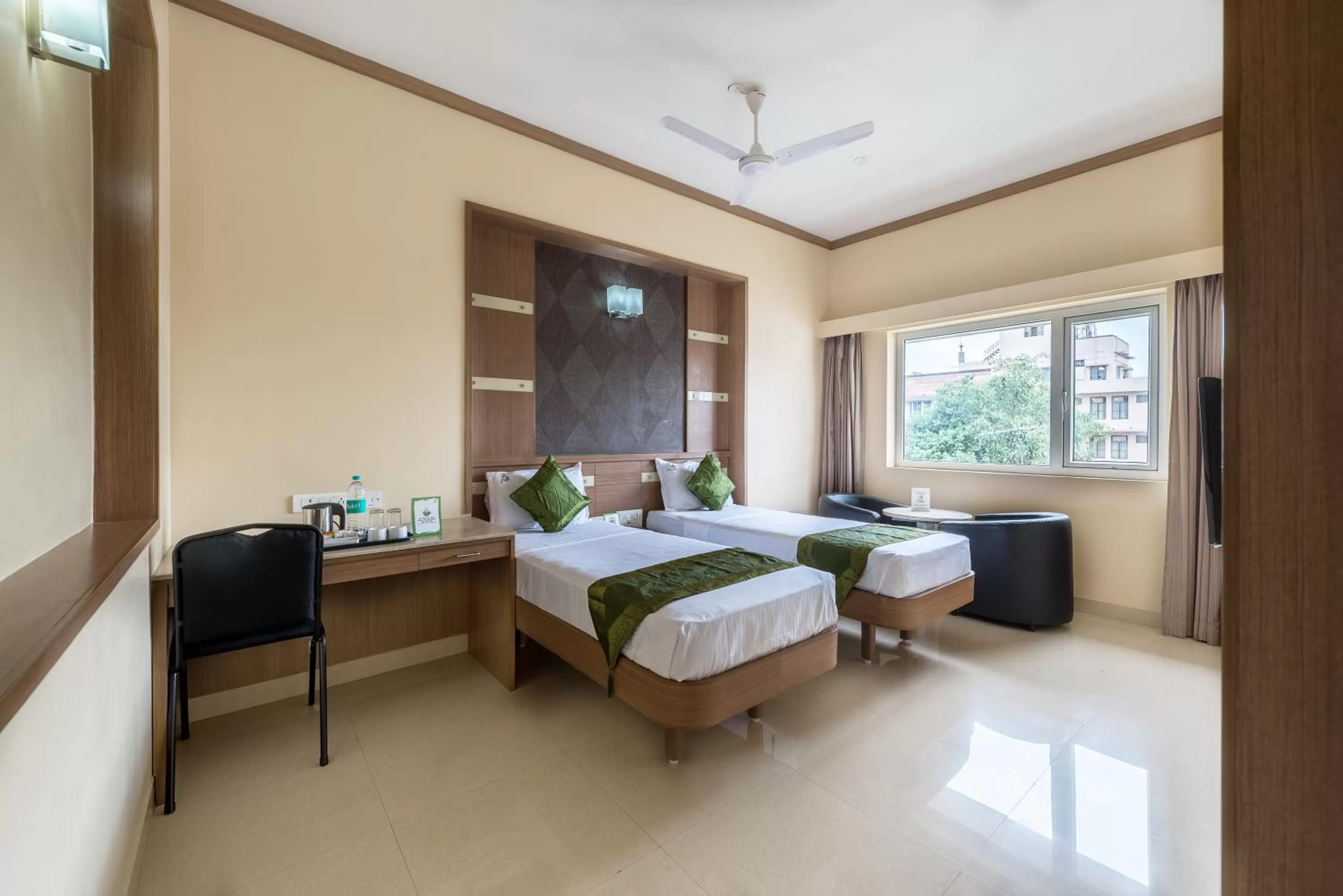 Bed in Treebo ESS Grande