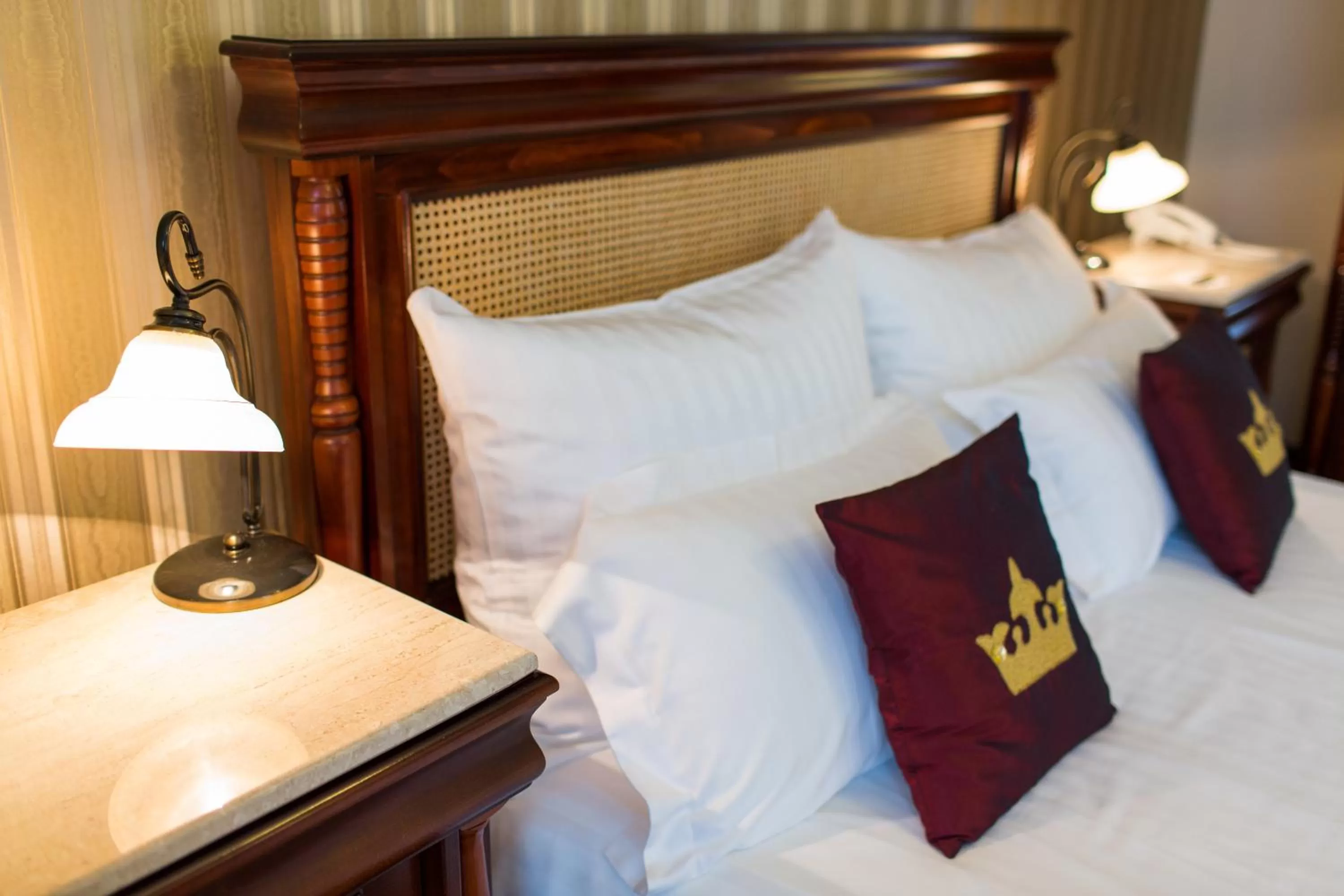 Bed in Vila Paris Boutique Hotel