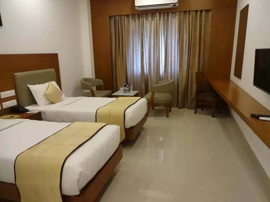 Bed in Hotel Park Residency