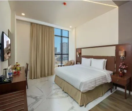 Photo of the whole room, Bed in Muscat Gate Hotel