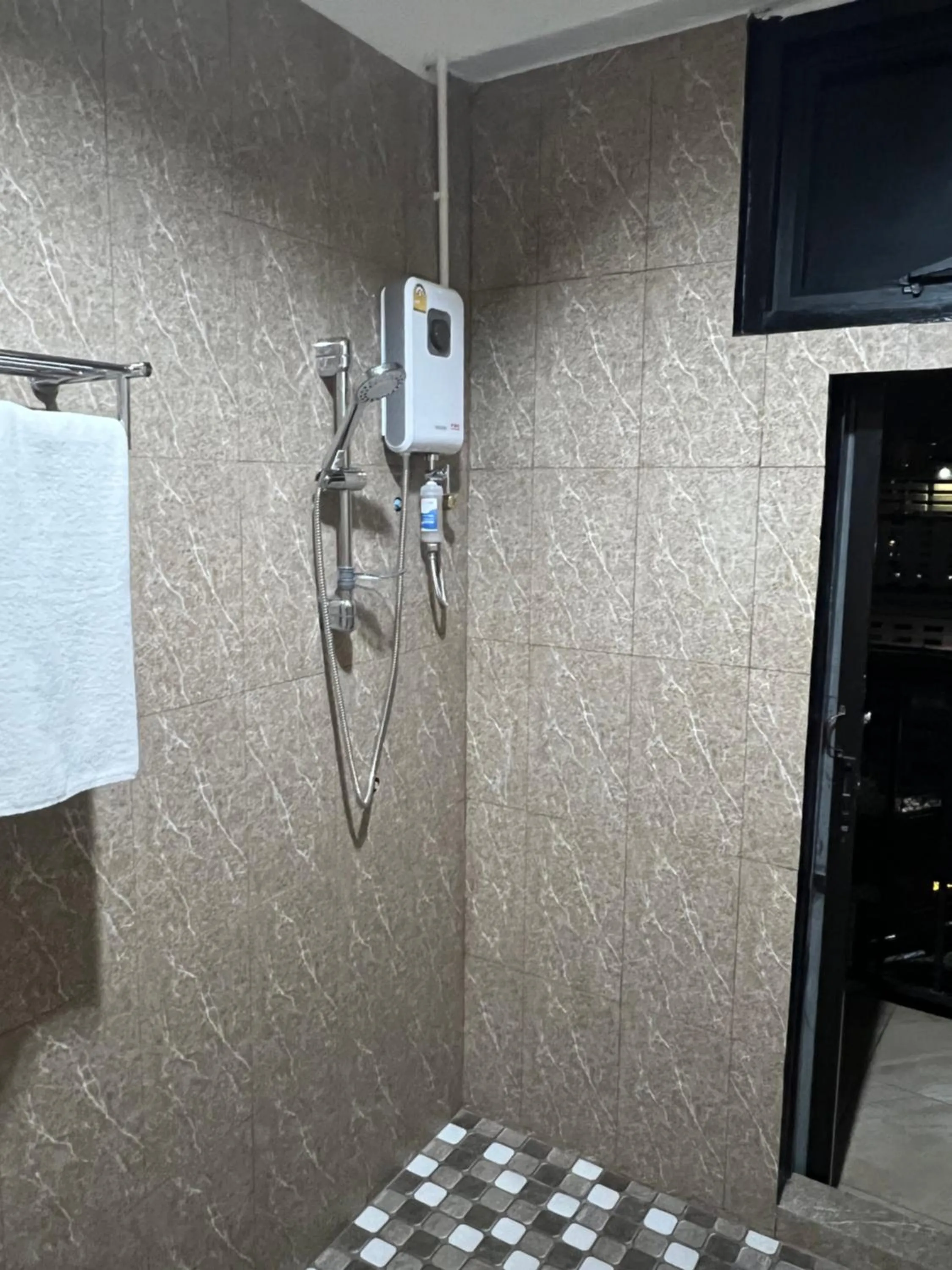 Shower in Mall Suites Hotel