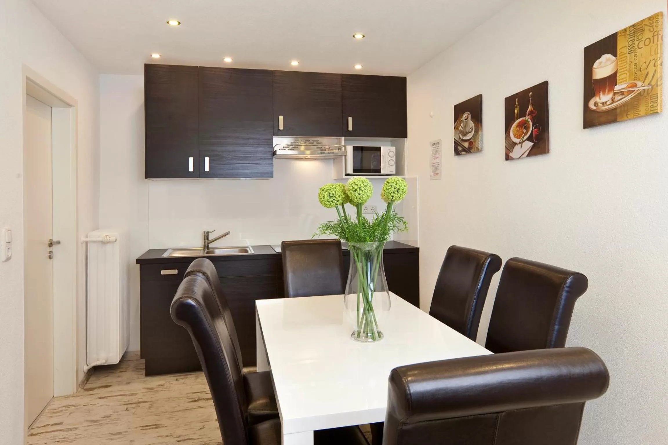 Kitchen or kitchenette in City Apart Hotel Füssen