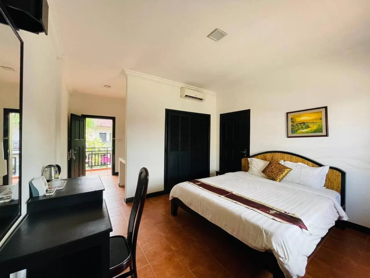 Photo of the whole room, Bed in Angkor Tiger Resort