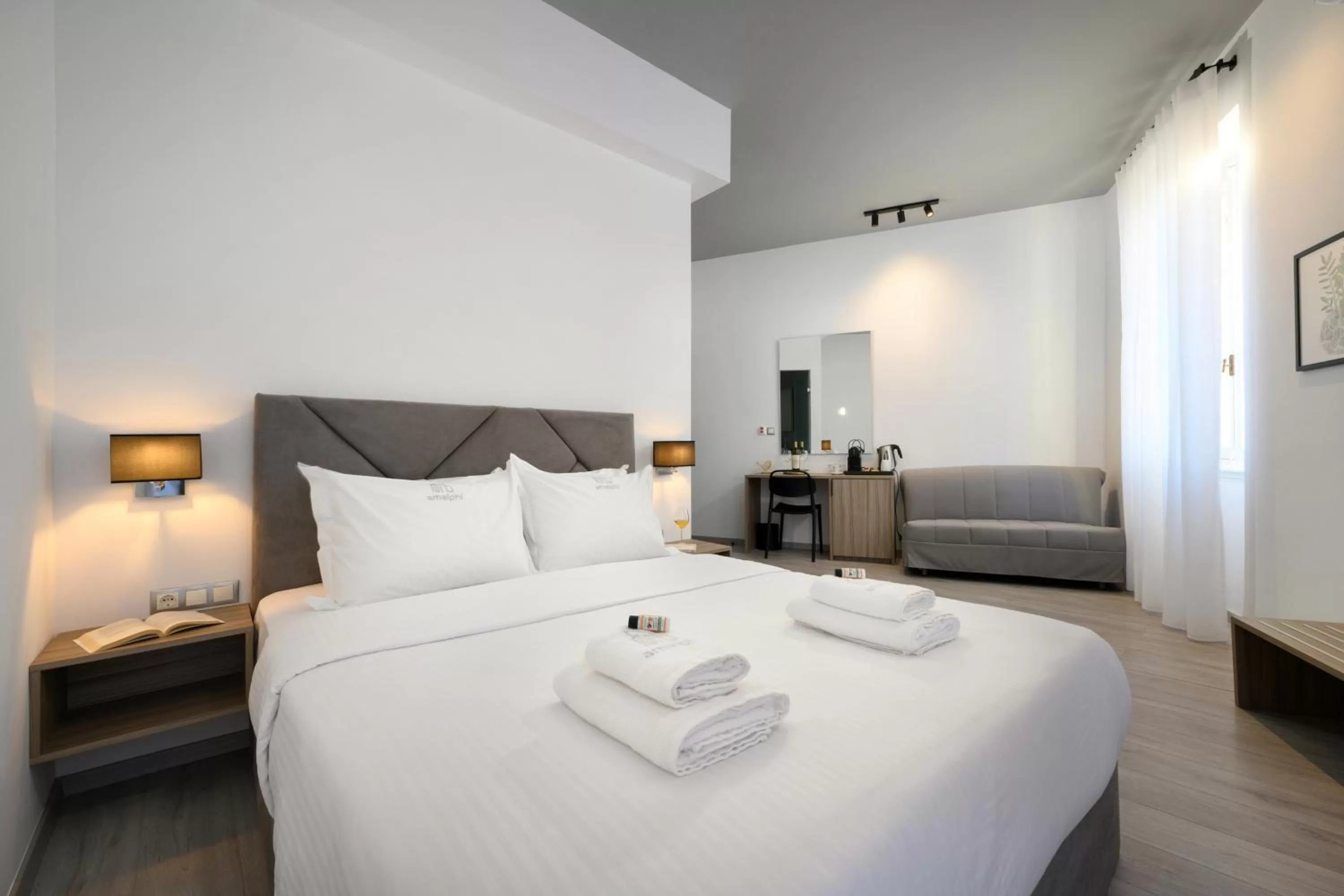 Bed in AMALPHI Corfu City Living