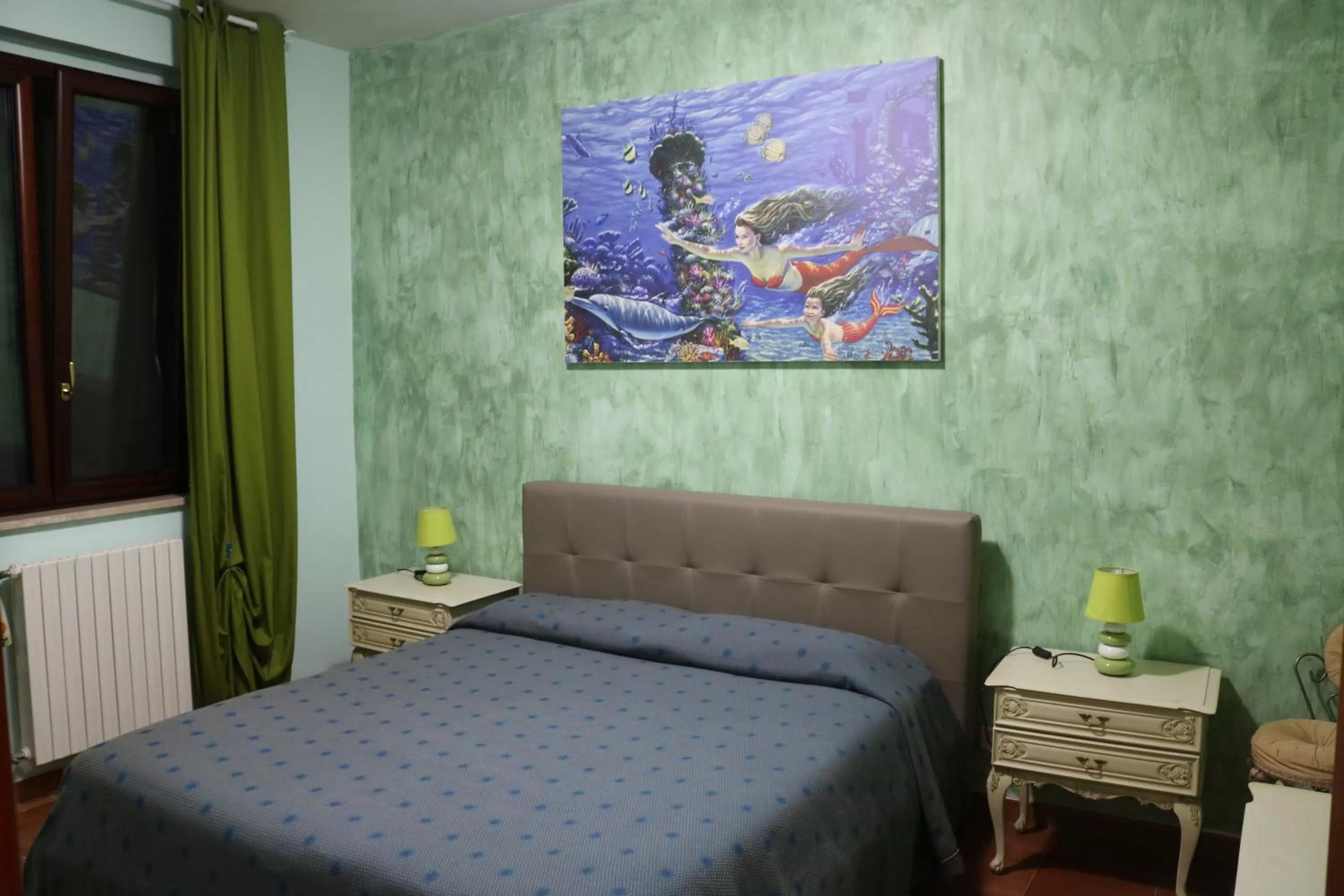 Bed in Le Sirene Bed and Breakfast