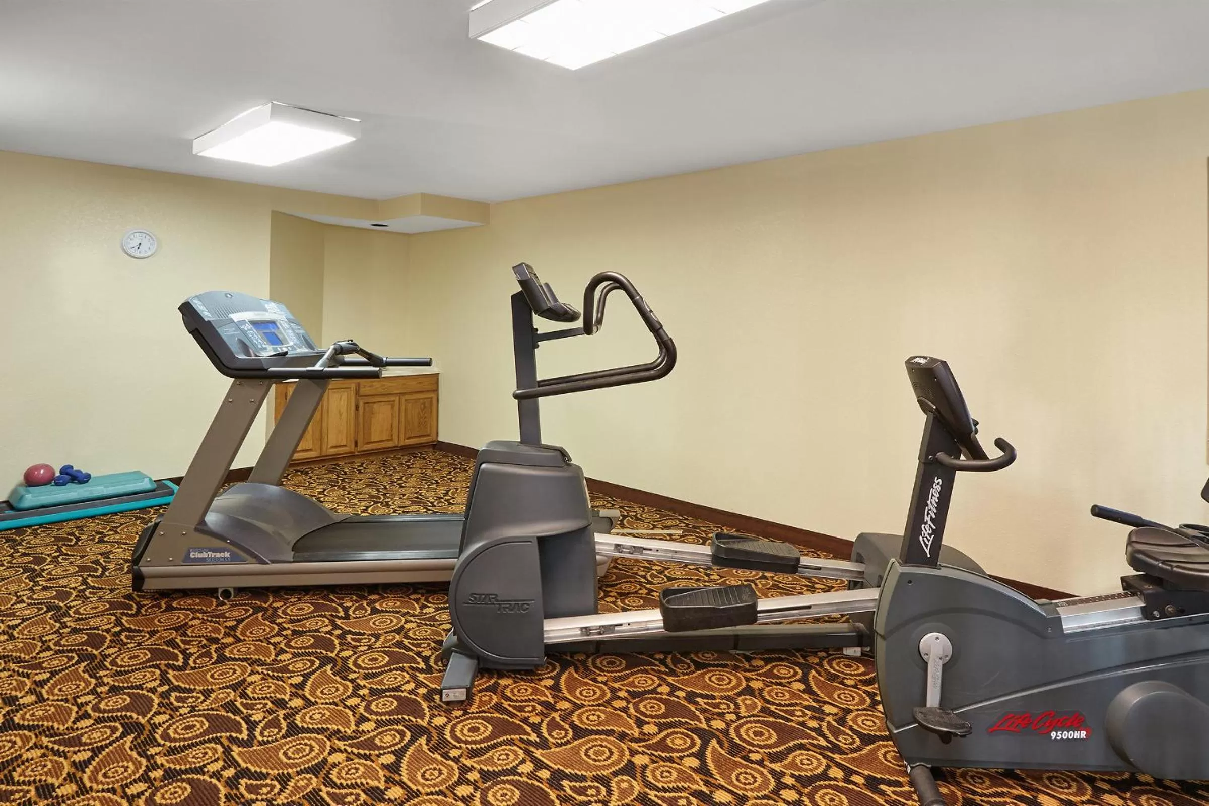 Fitness centre/facilities in AmericInn by Wyndham Elkhorn Near Lake Geneva