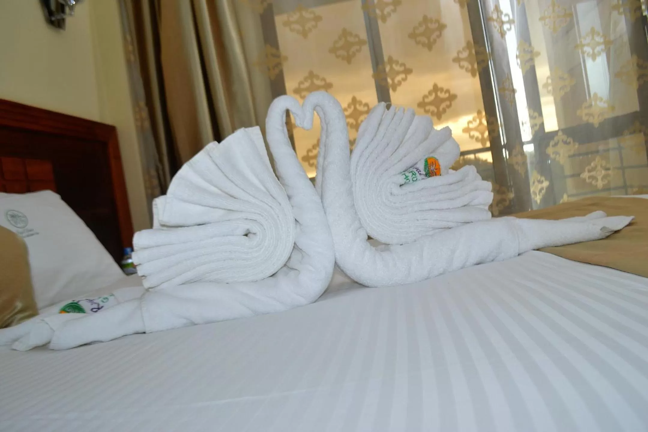 Bed in Royal Green Gardens Resort