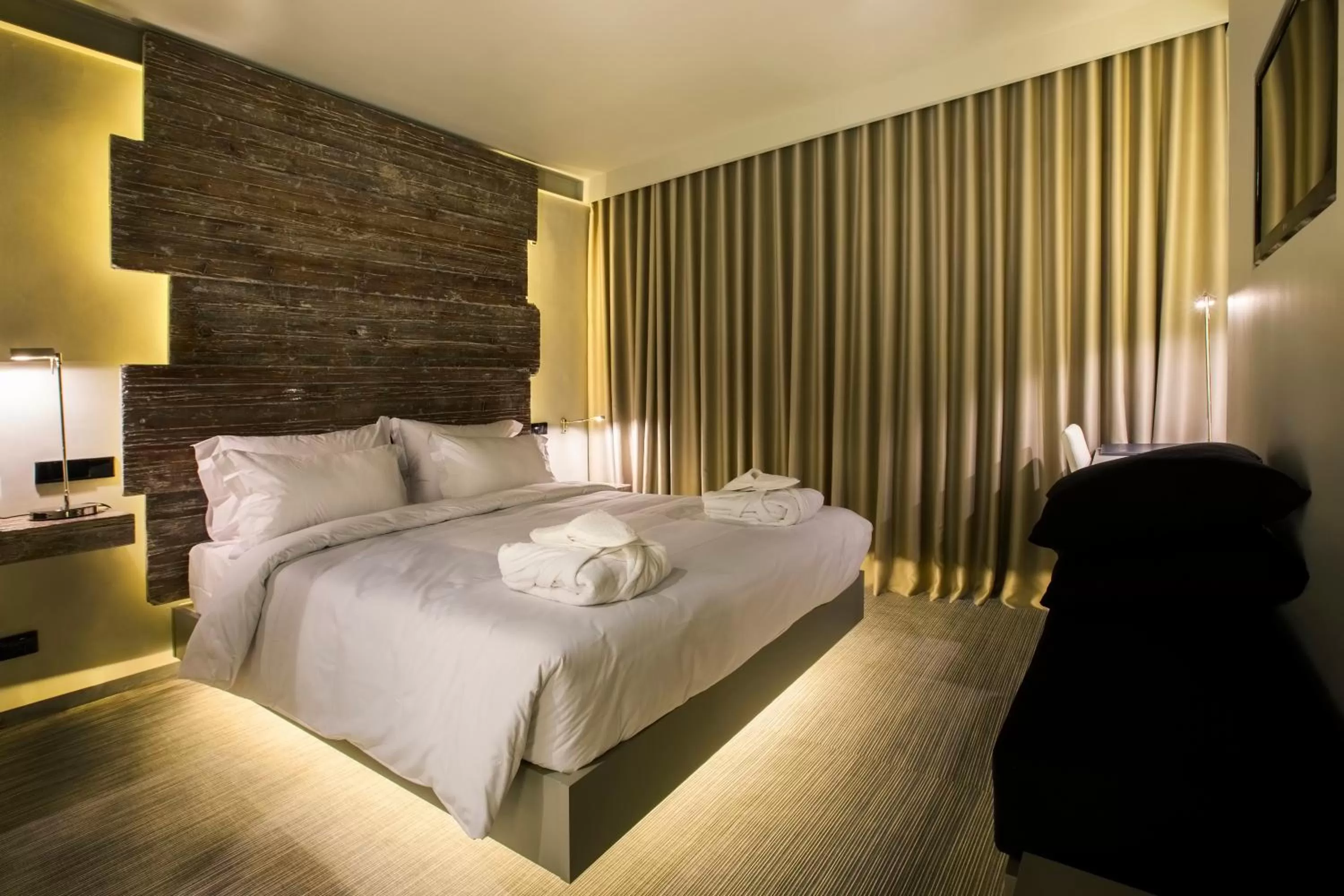Bed in Vitoria Stone Hotel