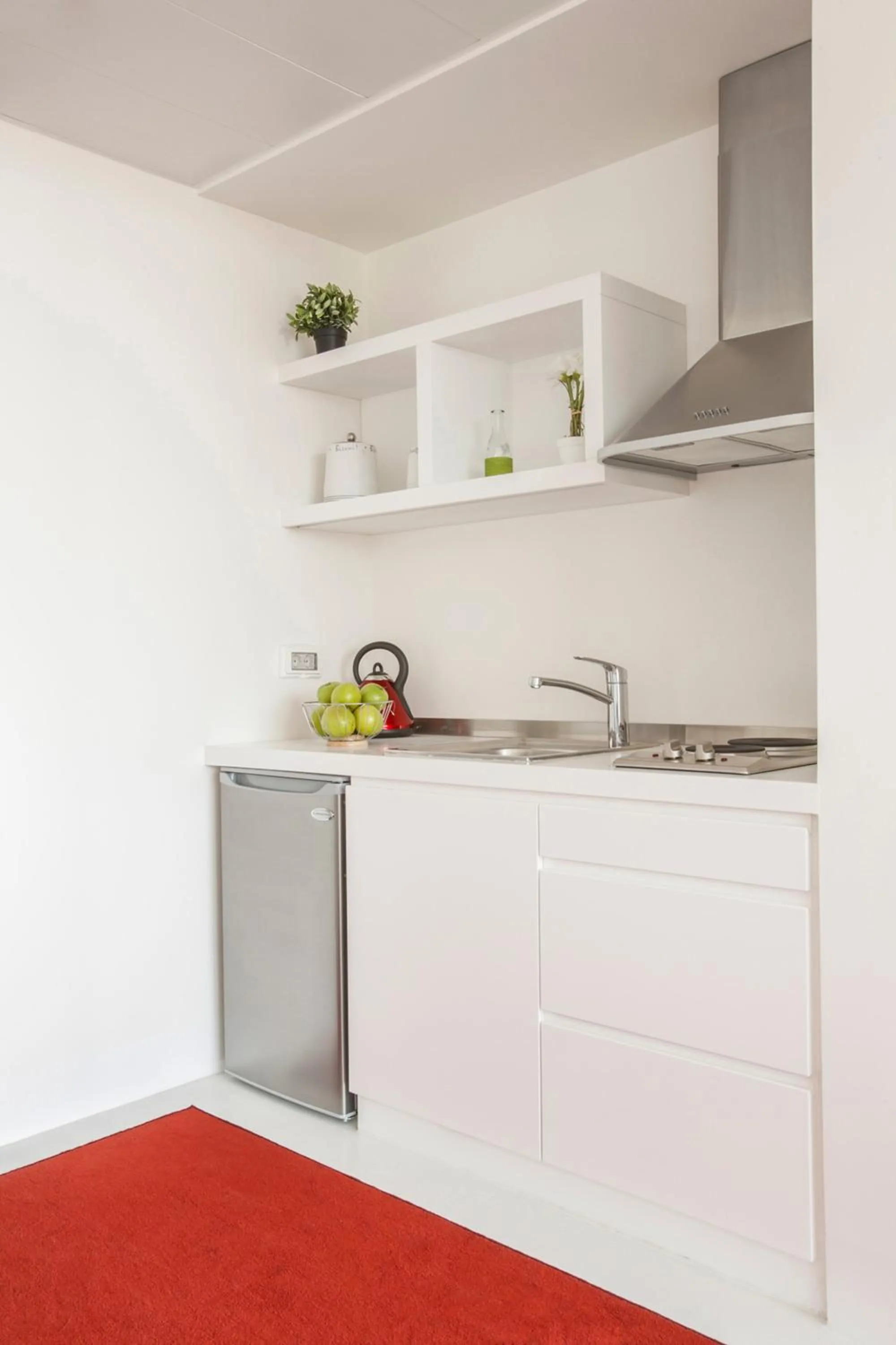 Kitchen or kitchenette in 1866 Court & Suites Hotel