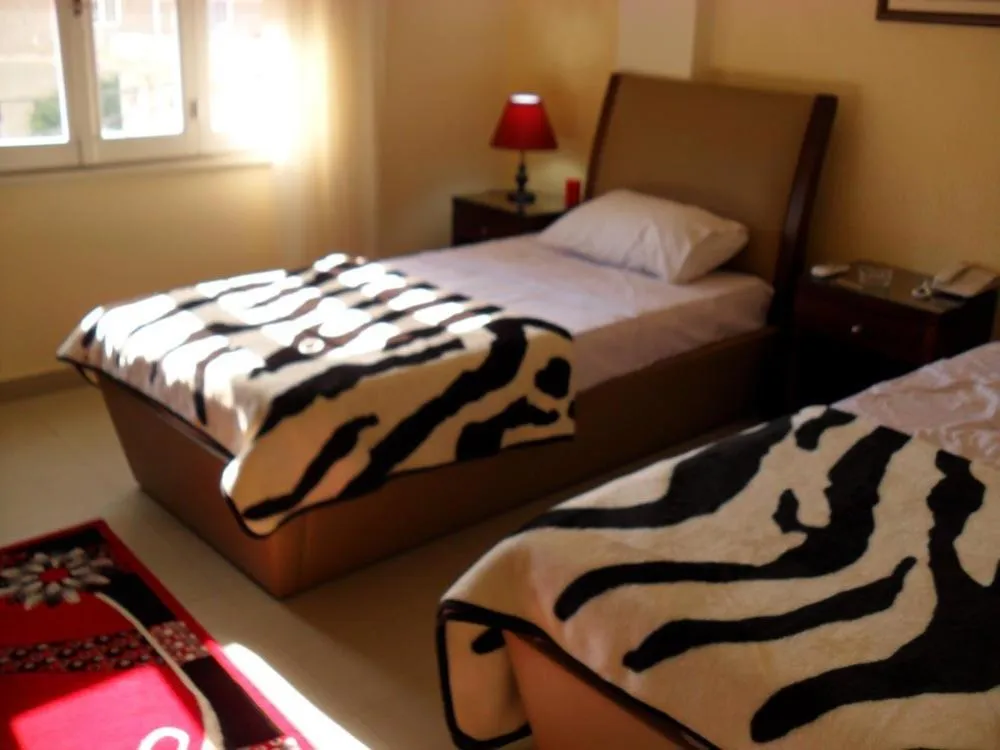 Bed in Alexander The Great Hotel