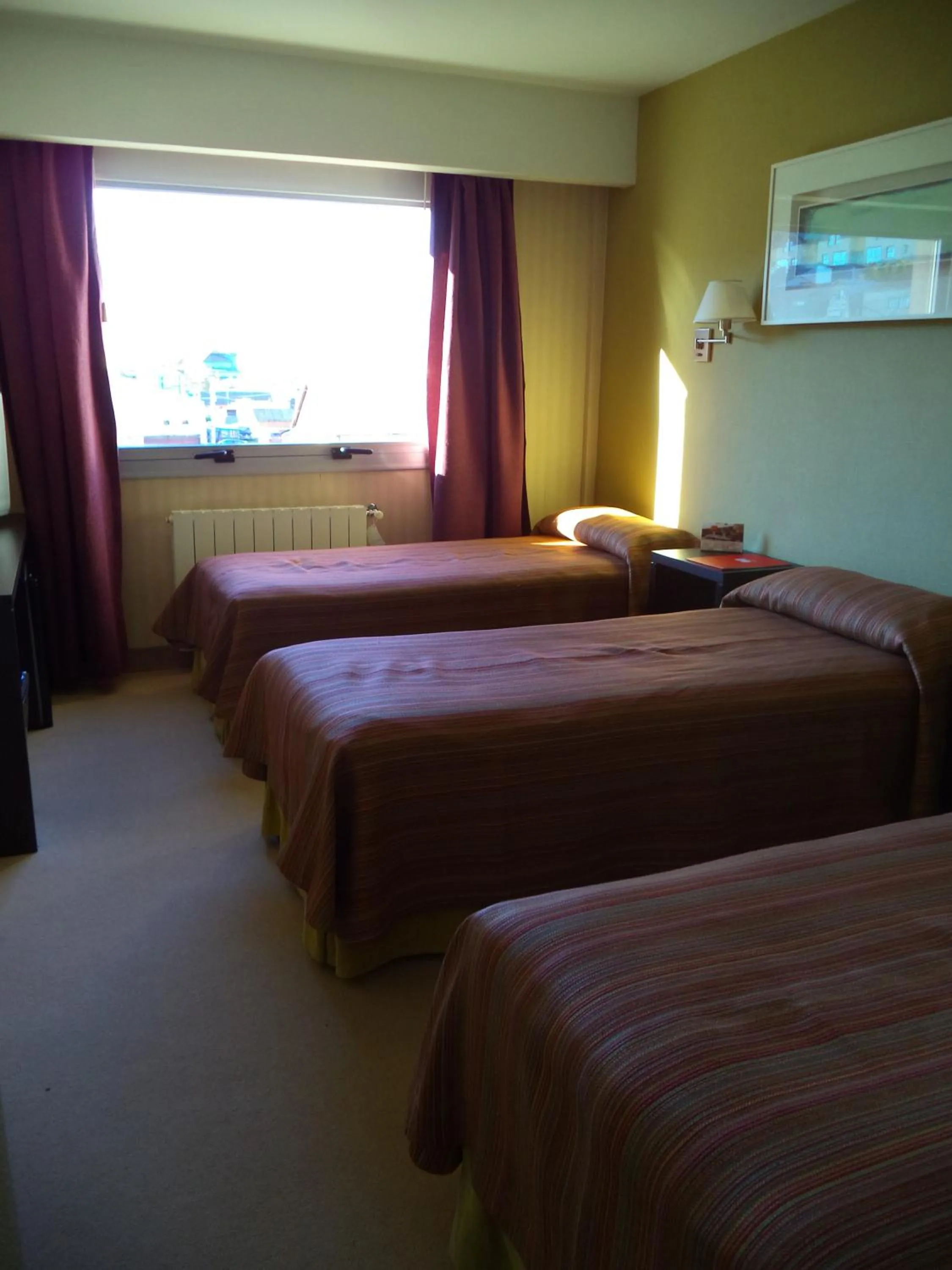 Photo of the whole room, Bed in MIL810 Ushuaia Hotel