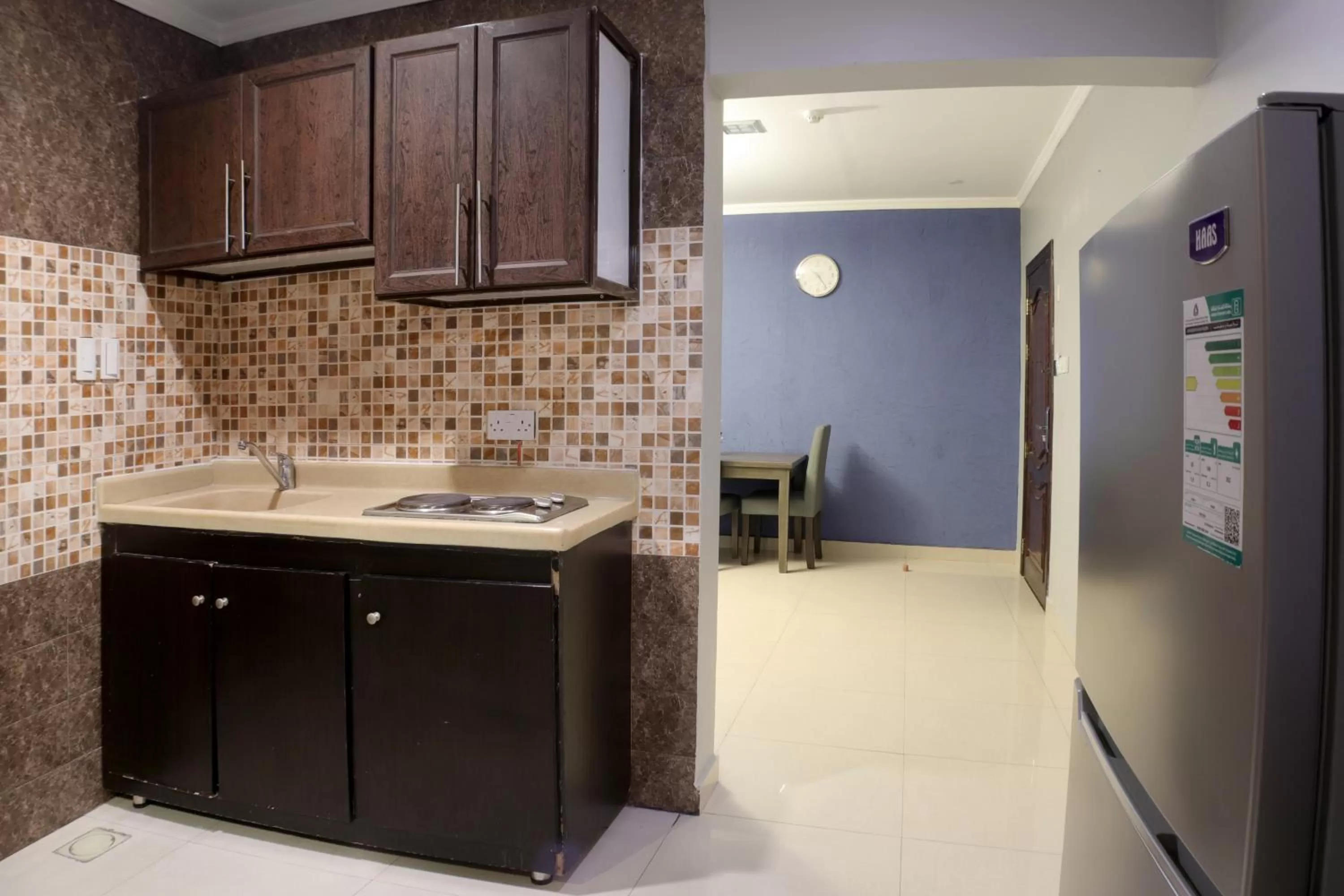 Kitchen or kitchenette in Maskan Al Dyafah Hotel Apartments