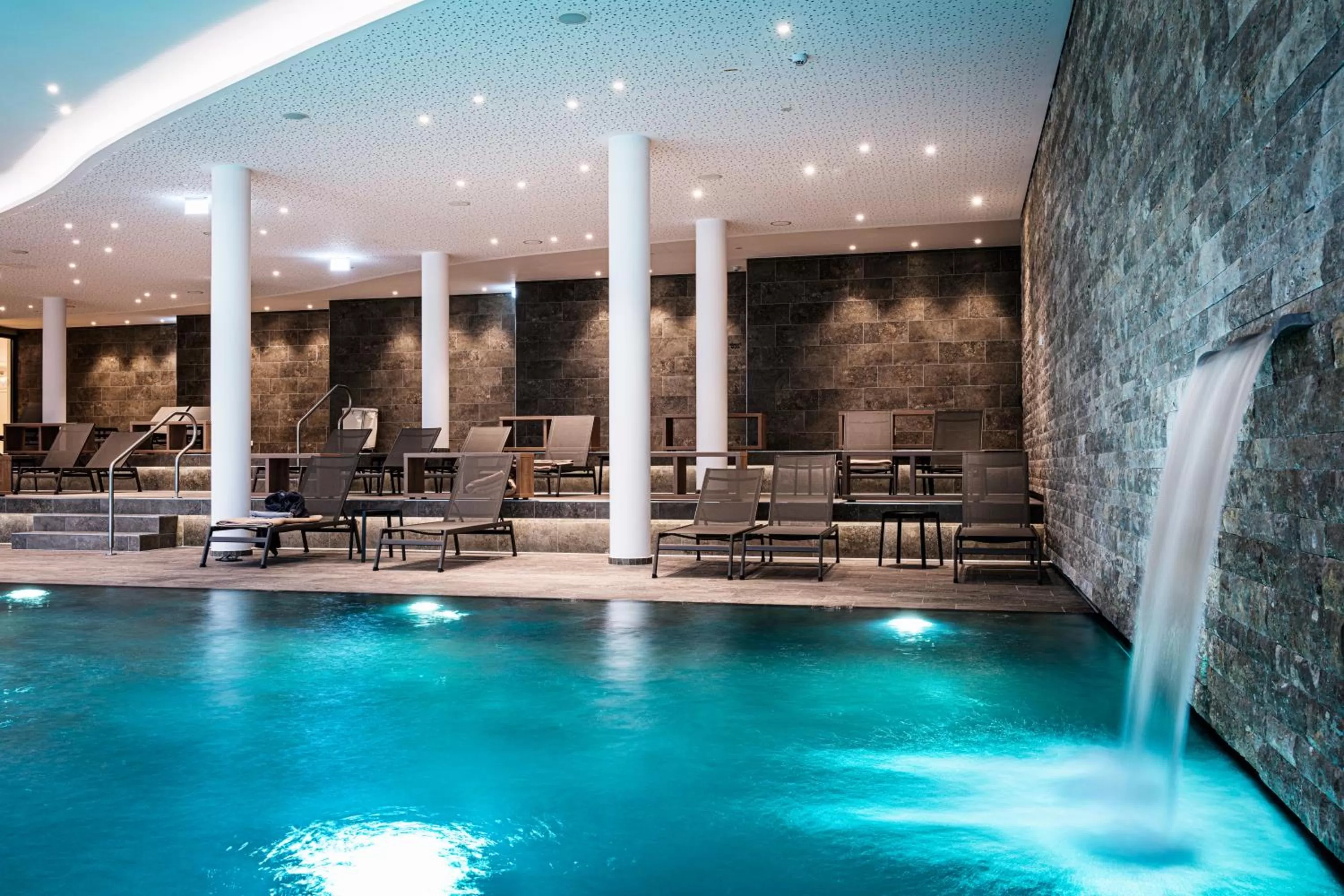 Swimming pool in AMERON Neuschwanstein Alpsee Resort & Spa