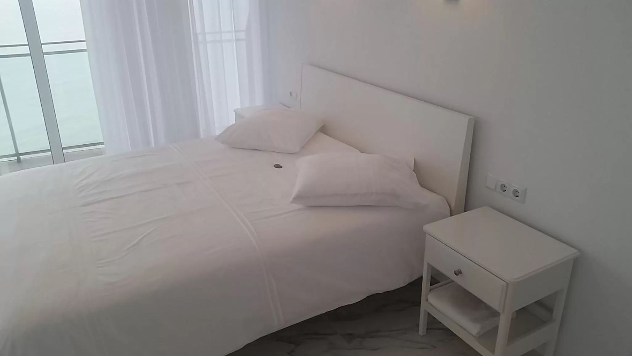 Bed in PURE WELLNESS SEA-VIEW Beluga & Dolphin Luxury HOTEL apartments