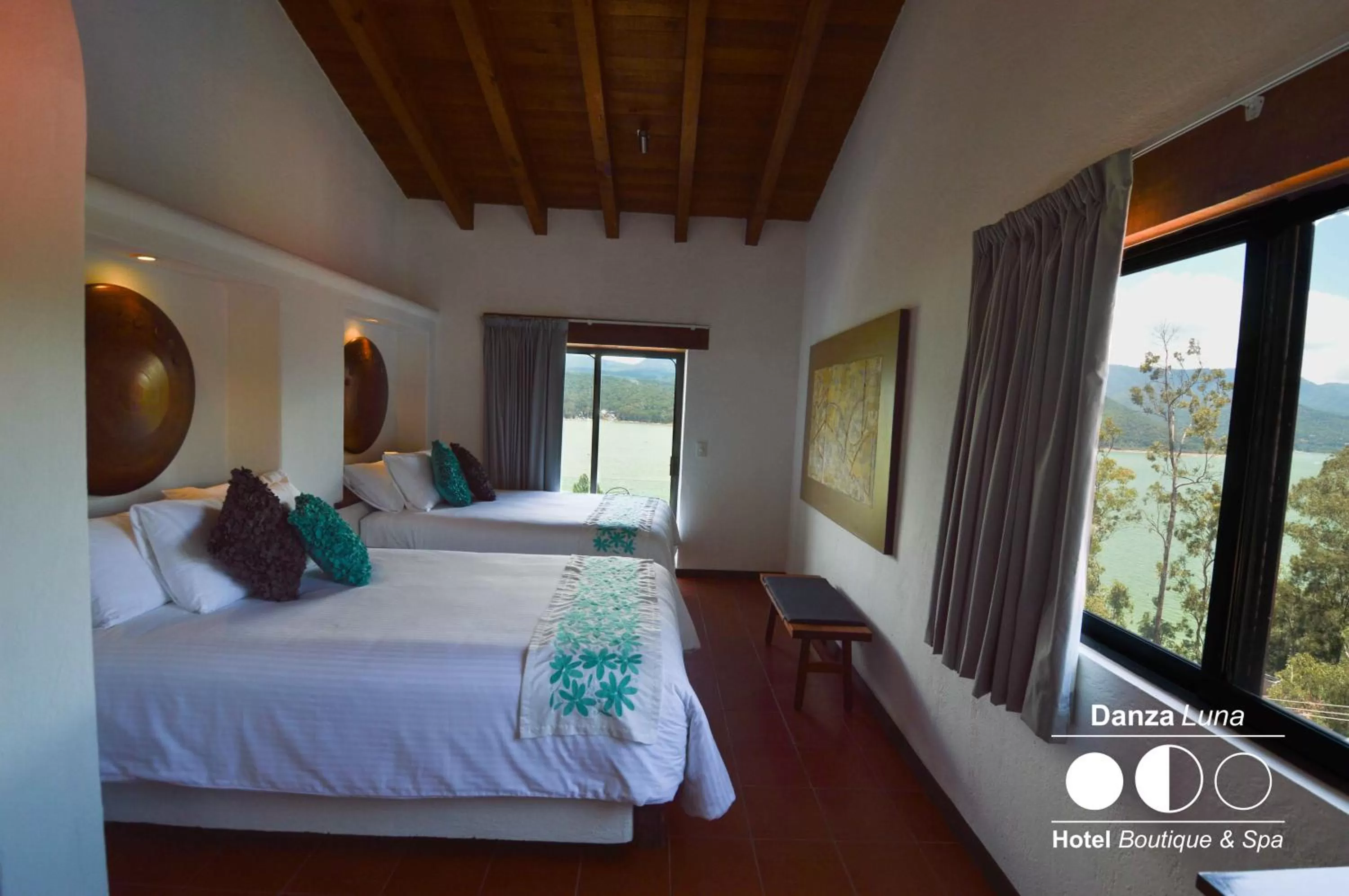 Bed in Danzaluna Hotel Boutique